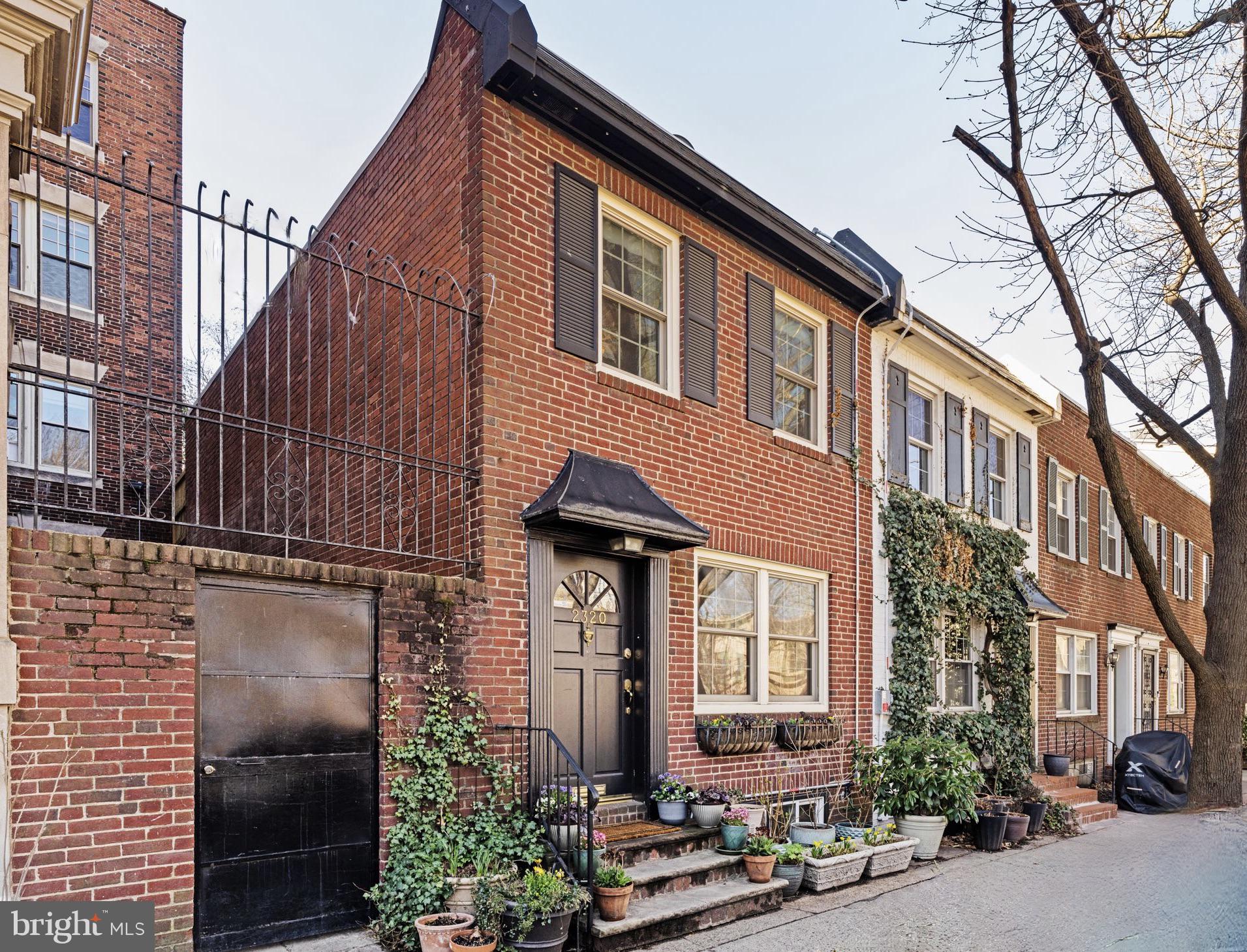 Welcome to 2320 Pine Street, which sits on a 75 FOOT deep lot positioned right on Fitler Square Park ! Situated on a charming block in one of the most sought-after neighborhoods in Philadelphia, this Fitler Square gem features 2 bedrooms, 1.5 baths, and two fabulous outdoor spaces. As you stroll through Fitler Square Park you will instantly fall in love with this quiet and neighborly block. With its red brick façade and beautiful shutters this home’s curb appeal is on point. Enter the living room featuring a wood burning fireplace, elegant built-in shelves to display your treasured home décor, and two large windows that highlight picturesque views of Fitler Square Park. Continue to the eat-in kitchen and spacious dining area that comfortably seats 6, plus a powder room down the hall convenient for your guests to use! Located off the dining area is a magnificent, serene 26 foot deep garden, surrounded by incredible greenery, including exquisite vines and trees. This expansive garden is the ultimate oasis, making it the perfect place to unwind and relax. On the second floor you will find the primary bedroom suite with spacious closets and a beautiful outdoor deck with southern exposure where you can enjoy your morning cup of coffee or tea. There is a second bedroom (park facing) and one full bathroom with an enormous skylight that allows for natural streaming light. Completing the home is a large unfinished basement with a washer and dryer and powder room. The basement makes for the perfect storage space! This home is literally just steps from Park. You’ll love living in close proximity to neighborhood favorites like Rival Brothers, Mr. Rabbit Coffee, Café Lutecia, Trattoria Carina, Ambrosia BYOB, Sallys, Friday, Saturday Sunday (James Beard Award Winner), Pub and Kitchen and more, are all just a short walk away! Enjoy outdoor activities including the scenic Schuylkill River Park, Markward Playground, tennis courts, and dog parks. The home is also close to UPenn (0.6 mi), CHOP (0.7), HUP (0.7), and Drexel (1.0). 2320 Pine Street offers the perfect balance of city living and neighborhood charm, making it an ideal location for someone seeking a convenient commute to University City or Center City while enjoying a true sense of community within the Greenfield School catchment. Make sure you come see this house. Look around, not many homes front the Park ! Move in as is or completely re-imagine the home and take advantage of its premier lot.