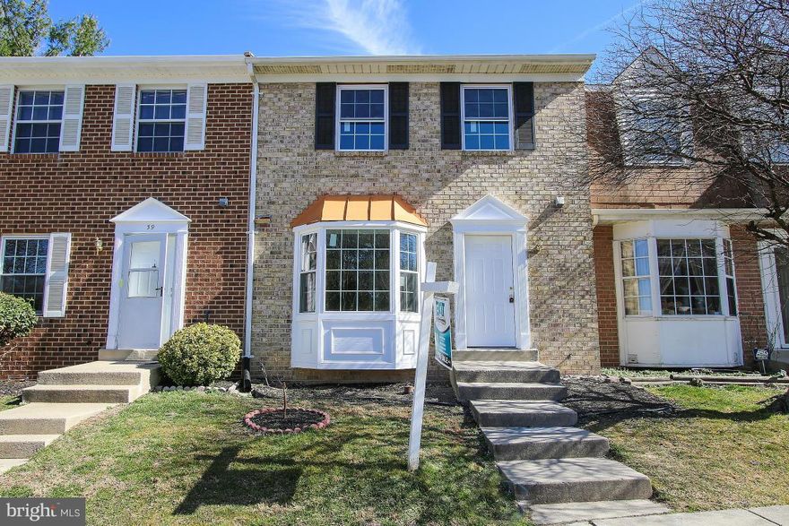 DO NOT MISS OUT on this amazingly beautiful contemporaty home...tell your agent to bring contract along when you view.Features hardwood floors throughout entire house except for basement, upgraded white cabinets and granite, fireplace with marble exterior, 3 full bathrooms, 1 half bath, recess lights, all brand new windows, new AC compressor..all elegantly put together...awaiting new owner.