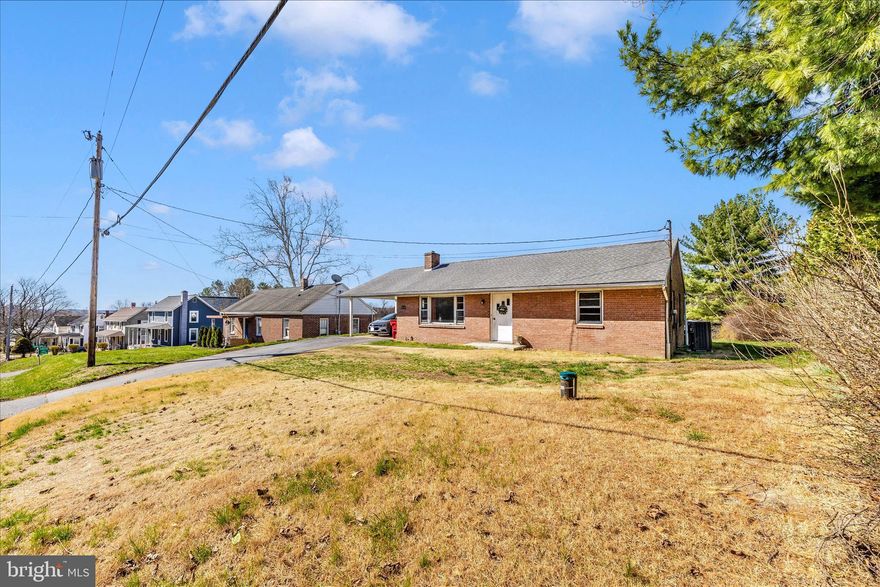 Discover the charm of this delightful ranch-style home, nestled on a generous 0.29-acre lot. Built in 1960, this brick beauty exudes timeless appeal while offering a canvas for your personal touch. With 1,064 square feet of living space, this cozy residence features two inviting bedrooms and a full bathroom, perfect for relaxation and rejuvenation. Step inside to find a warm and welcoming atmosphere, where natural light dances through the windows, illuminating the potential of each room. The full basement, with both interior access and an outside entrance, presents endless possibilities-transform it into a recreation room, home gym, or additional storage space to suit your lifestyle. The attached carport and driveway provide convenient parking options, ensuring you and your guests feel right at home. Enjoy the tranquility of your spacious yard, ideal for outdoor gatherings, gardening, or simply unwinding after a long day. Located in a peaceful setting, this home offers the perfect blend of comfort and convenience. With no association fees or community restrictions, you have the freedom to create your own oasis. Embrace the opportunity to make this charming property your own and experience the joy of homeownership in a space that truly feels like home. Don't miss out on this wonderful opportunity-schedule your private tour today!