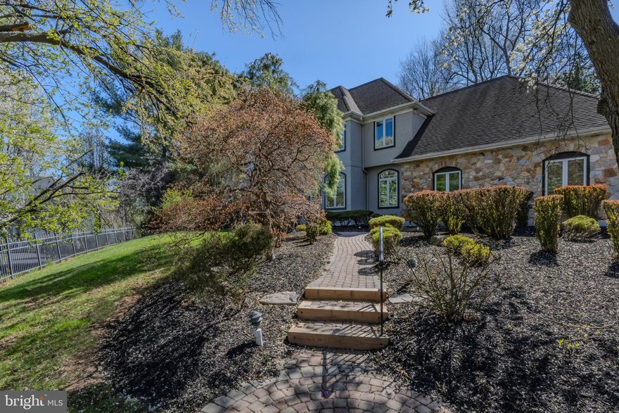 Welcome to 309 Bowers Ln. in the coveted Rose Tree Media School District, offering you a resort like lifestyle just minutes from some of the best shopping & dining in Media Boro.  This exceptionally appointed 4,000+ sf home with in- law quarters in the lower level & property is something out of a magazine.  Pull up and fall in love with the cul-de-sac setting & the stature of the home itself, perfectly perched on the 1.36 acre lot.  Pull into the long private driveway & head on in.  The 2 story foyer greets you & so does tons of natural light that comes from each direction.  The first floor of the home is exactly what you’re looking for- a large circular flow, all the living space you need to include a grand formal living room with fireplace & arched windows, a stunning formal dining room with ceiling beam, picture frame molding detail & oak floors with a walnut inlay.  The beautifully renovated kitchen has a massive center island for seating & storage, top of the line stainless steel appliances to include a 48 inch range, gorgeous stone countertops & upgraded cabinetry & lighting.  The sellers thoughtfully renovated the kitchen top to bottom & installed the most gorgeous & custom oversized slider door that lets in so much light, offering access to the large trex deck & property.  The butlers pantry space is perfect for entertaining & equipped with a 2nd fridge/freezer, dishwasher, wet bar, top of the line wine fridge, gorgeous glass front cabinets & tons of counter space for setting up your cocktail bar.   Don’t miss the built-in Miele coffee station!  The 2 story great room off the kitchen with its stonefront floor to ceiling fireplace, skylights & oversized windows is the perfect place to host guests, but more importantly your respite after a long day.  The office is right off the great room.  The first floor powder room is large with custom tile-work, hidden cabinetry with sink & laundry (1 of 3 laundry set ups in the home)!  The slate style tile throughout the kitchen, butlers pantry, entry from the 3 car garage & powder room makes this side of the home feel cohesive & so does the oak hardwood flooring on the other side of the home that was just refinished.  The 2nd floor offers 4 large bedrooms, (one currently used as a dressing room), each with great closet space.  The primary bedroom has a vaulted tray ceiling, custom millwork, high end carpet, 2 walk-in closets & a renovated bath with soaking tub, high stunning fixtures, gorgeous tilework & seamless shower surround.  Enjoy a 2nd laundry set up on the 2nd floor.  The walk-out lower level of this home has so much going for it!  A secondary kitchen with stainless steel appliances, tons of cabinets, fridge & walk-in pantry, full bathroom, 3rd laundry area, a large and open rec room with wet bar & a room that could make a perfect office or bedroom.  This lower level is perfect for an in-law suite, au pair or guests.  Your outdoor oasis awaits!  The pool, landscaping, swim up bar (with tv and countertop), hot tub, mermaid fountain, built-in speaker system & pool house makes this property unbelievable! The poolhouse has 2 different changing areas & 2 bathrooms so your guests won’t ever have to wait. There is nothing not to love about this home & property.  The materials used inside and out are top of the line.  It’s truly a one in a million opportunity.  It’s so versatile inside & out, the current owners have loved it so much & you too will be so proud to call it your own.