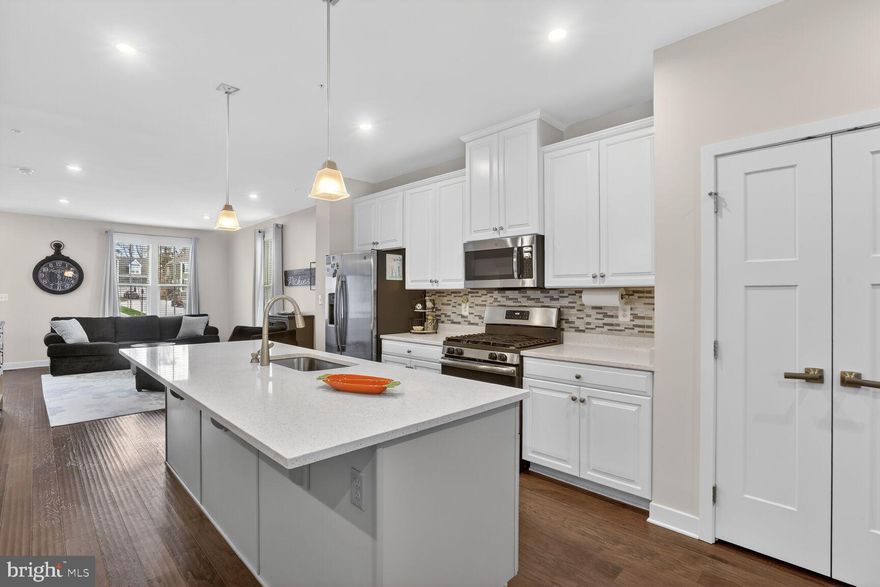 Modern End Unit Townhome with Private Deck, Bright Open Layout & 2 Car Garage

Rare opportunity to own a beautifully maintained end unit townhome in a highly desirable newer community. Built in 2019 and showing like a model home, this property offers the perfect blend of modern design, comfort, and convenience.

From the moment you enter inside, you’re welcomed by abundant natural light and a bright open-concept layout designed for both everyday living and effortless entertaining. The kitchen is the heart of the home, featuring quartz countertops, a spacious center island, sleek modern appliances, and plenty of space for gathering.

Just off the main living area, step onto your private deck, the perfect extension of your living space. Imagine starting your morning with coffee on the deck as the day begins or hosting friends and family for relaxed evenings at home.

Upstairs, the spacious primary suite provides a peaceful retreat complete with a luxurious en-suite bath and generous closet space. Two additional bedrooms offer flexibility for family, guests, or a dedicated home office.

The fully finished lower level adds incredible versatility and can easily serve as a family room, media room, gym, play space, or additional workspace to fit your lifestyle.

End unit homes offer added privacy and extra natural light, creating an even more open and inviting feel throughout. With modern finishes, a 2 car garage, and a fantastic location, this home truly checks all the boxes. Ideally located near popular restaurants, shopping, and local favorites, offering both comfort and convenience.

Homes with this layout, condition, and location rarely become available. Move in ready and easy to show. Schedule your private showing before this opportunity is gone.