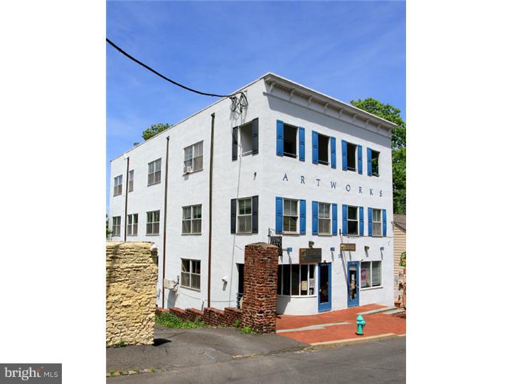 Multi-tenant office/retail and two apartments, elevator-serviced concrete and steel building. No on-site parking. Sold while fully occupied, closed with one 300 sq ft office tenant vacancy. Approximate 7.4% CAP rate.