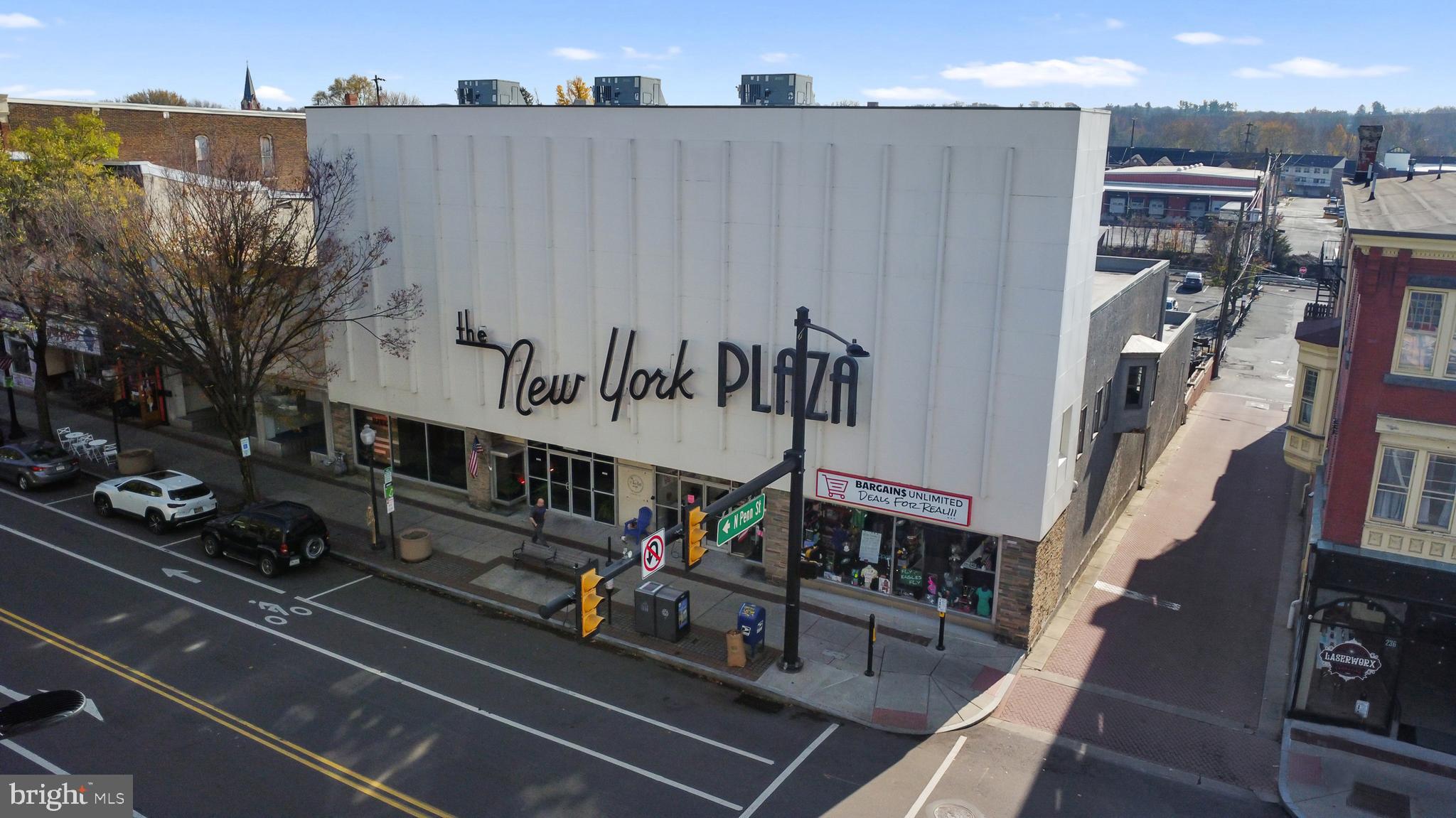 Wee 238-244 E High Street in Pottstown, PA. Formally known as The New York Plaza, this is one of the most prominent buildings in town! With over 30,000 SF, a large +/- 90 car parking lot, and 4 floors, it's currently home to three tenants, a food/beverage and event space, retail store, and a non profit organization occupying the ground and lower levels. Levels 3 and 4 would be ideal for apartments and in its current configuration there are four units on the third floor and three units on the fourth floor. Each space has its own plumbing, set of utilities, and fire escape. In addition to the major value add of the apartment conversion, buyers will be happy to know that the entire building is sprinklered, has 3 phase power with upgraded panels throughout, newer mechanicals, and a piston driven elevator. There is no other property like this available in Pottstown.
