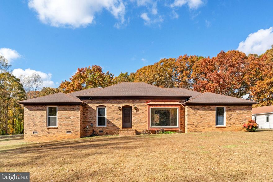 Welcome to 557 Copper Line, a beautiful 1 level brick rancher! 3 bed/2 full bath with great open floor plan. Come check out this newly renovated open kitchen with tons of cabinets, new flooring throughout, separate dining room, great office space with wood burning fireplace and large rooms with separate newly renovated on suite bath in the primary bath. Outside you'll fall in love with a huge back deck with a canopy cover perfect for hosting! There is plenty of space for animals including horses as there is a spacious horse barn with fenced-in pasture. Last but certainly not least is a massive detached 6 car garage and workshop, a mechanics dream. Privacy galore and a spacious yard on nearly 8 acres. This home is a must see!