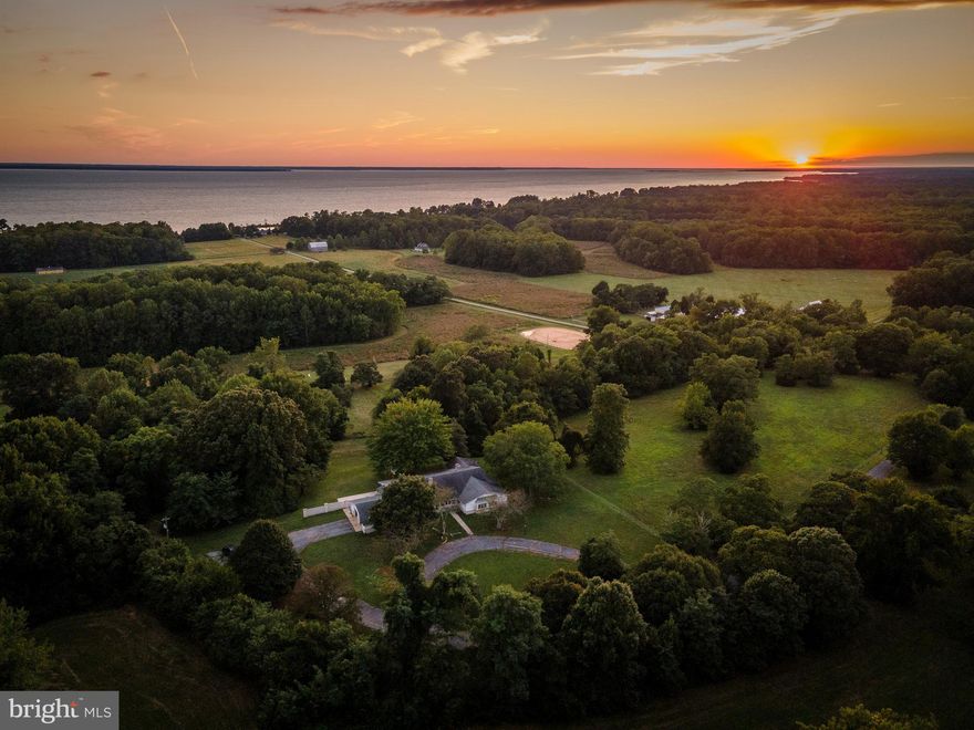 Estate sale located in a farm setting on 2 acres!  House has good bones but needs some additional renovations.  Kitchen has tiled brick floor, granite counters & stainless appliances.  Master bath & kitchen were remodeled  about 10 years ago.  Hardwood floors in most of the rooms.  Built in bookshelves in office.  Large dining room with french doors to screened porch.  Breakfast room.  Step down great room with fireplace.   Oil furnace with 4 zones.   No working AC.  Two septics.  New well.  Garage doors do not close.  Sold AS IS. Lot size is 2 acres and subject to final boundary line approval.