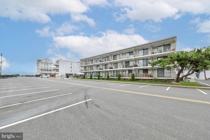 This exquisite Ocean-block, 1 bedroom, 1 bath condo is a tranquil seaside retreat that offers the perfect blend of coastal elegance and modern convenience. With beautiful views of the Atlantic Ocean from its private balcony, this Ocean City property is a haven for those seeking a beach convenience lifestyle. Upon entering, you'll be greeted by a soothing and neutral coastal color palette that sets the tone for a relaxed and inviting atmosphere. The condo boasts an open-concept design, seamlessly blending the living, kitchen, and dining areas into one open and airy living space. Sunlight streams through the large glass sliding door, illuminating the interior and enhancing the serene coastal ambiance. The living room features a cozy fireplace that adds warmth and is a place to gather. Step out onto your private balcony to savor the mesmerizing views of the ocean and endless horizon. Whether it's morning coffee or sunset cocktails, this balcony offers an ideal spot to unwind and enjoy the ocean breeze. The kitchen is complete with a breakfast bar island, granite counters, and ample cabinetry. It's perfectly designed with an open connection to the living and dining areas. The spacious bedroom is a serene oasis with coastal-inspired décor. It provides a restful sanctuary after a day of beachfront adventures. The attached bathroom provides dual access from the hall. For added convenience, this condo is being sold fully furnished, making it turnkey for your immediate enjoyment and rental potential. A ground-level storage unit is included, providing ample space to store beach supplies, bikes, and more. The building features a newly installed roof and 1 assigned parking space with plenty of guest parking available. Experience the epitome of coastal living in this tastefully designed condo with ocean views.