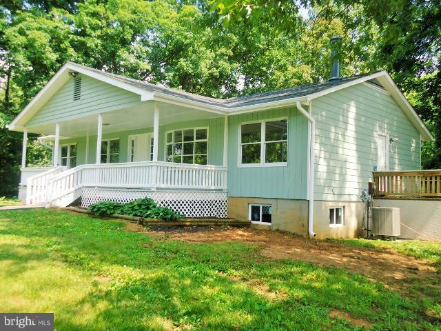 Fully remodeled rancher on a gorgeous, partially wooded, 2.5 park-like acres! 3 bedrooms, 2 baths with a full unfinished basement. Almost everything in this home is new! Hardwood floors! Large detached 40x24 garage. AHS Home Warranty conveys with home!