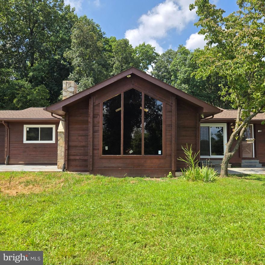 Nestled among mature trees, this charming rental property offers a serene retreat with the perfect blend of nature and convenience. This home features two separate rental units- one located on the upper level and another on the lower level- offering privacy while sharing the same property.   Located just minutes from shopping centers and major commuter routes, it provides easy access to everything you need while offering the peace and privacy of a wooded setting. Ideal for those who value both tranquility and a connected lifestyle.
The application fee is $55.  All applicants over the age of 18 must apply.  Minimum 1-year lease / Pets not allowed / No smoking .  The lower level unit is currently occupied.