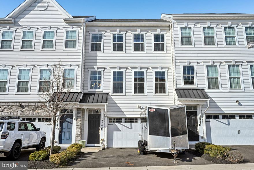 Welcome to this move-in ready and beautifully maintained townhome in the sought-after High Grove community, located in the Central Bucks School District. This home features a bright and open main level with an upgraded kitchen, spacious living area, and dedicated dining space with access to a private balcony. A convenient half bath completes the main floor. The upper level includes three well-sized bedrooms and two full baths, including a generous Primary Suite with a walk-in closet and ensuite bath complete with a soaking tub, glass enclosed shower and dual vanity. The finished walkout lower-level offers additional flexible living space with direct access to the attached garage. Conveniently situated near shopping, dining, and local amenities! Schedule your showing today.