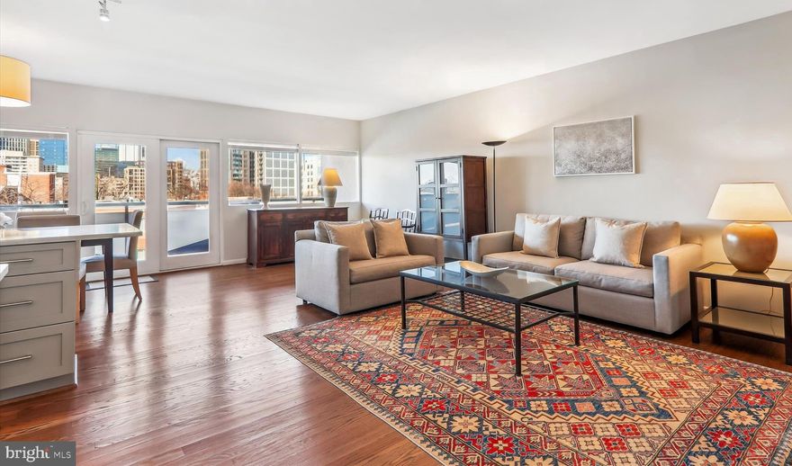 Discover this beautifully renovated 2 bedroom, 2 bathroom condominium in a sought-after Bethesda/Chevy Chase location, combining luxury, comfort and convenience. With a Walk Score of 88, everything is at your doorstep! As soon as you enter this unit, you will love the sense of space. This move-in ready home features sleek, contemporary finishes and sun-filled rooms, offering a tranquil haven while keeping you close to all the best that this area has to offer. The beautifully renovated kitchen is equipped with stunning granite countertops, a stylish porcelain tile backsplash, stainless steel appliances, and a great island with extra seating.  A large dining area connects the kitchen to the spacious living room, ideal for everyday living and entertaining. Natural light floods the main living area through large windows and sliding doors that open to a large private balcony with beautiful views of downtown Bethesda. The generously sized primary bedroom includes a modern en-suite bathroom, and both bedrooms offer walk-in closets for ample storage and privacy. Additional perks include a newly renovated, inviting lobby, an assigned parking space, and an extra storage unit. With top-rated restaurants, shopping, and both the Bethesda and Friendship Heights Metro stations just a short walk away, this location is the best of all worlds! The Capitol Crescent Trail, Norwood Park, and a variety of recreational amenities are nearby, offering green spaces, playgrounds, tennis courts, and an aquatic center—all practically in your backyard. This stylish condo provides the best of Bethesda living, with modern comforts and outdoor amenities you’ll love. Contact us for a showing today!