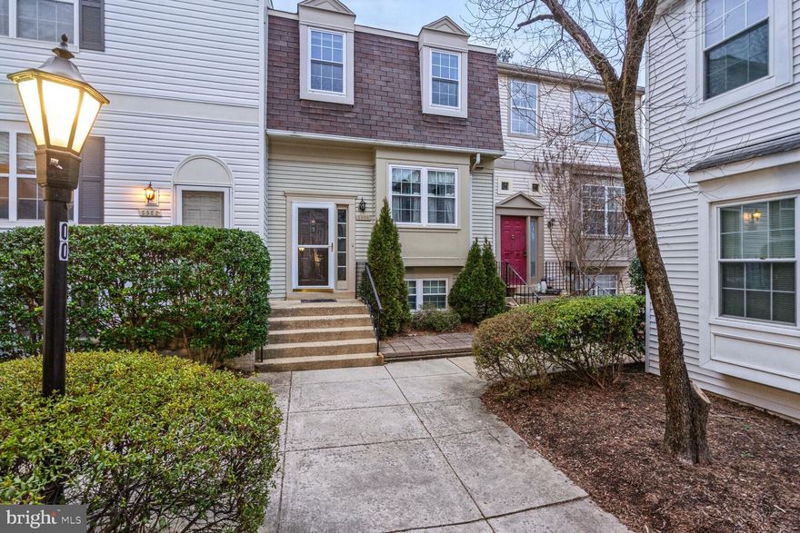 Stunning three-story townhouse overlooking a charming courtyard. Featuring three generously sized bedrooms and three full baths, with the potential for a fourth bedroom in the basement. The kitchen is expansive, offering ample cabinet space. The owner's suite has an en-suite bathroom, while outside, a private patio provides a serene retreat. Enjoy wall-to-wall carpeting and ceiling fans throughout the entire home. Conveniently located within walking distance to shops, restaurants, the VRE, a shuttle to GMU, and the metro bus. Professionally managed. Online application. Excellent credit required. $50 application fee. One application per adult occupant