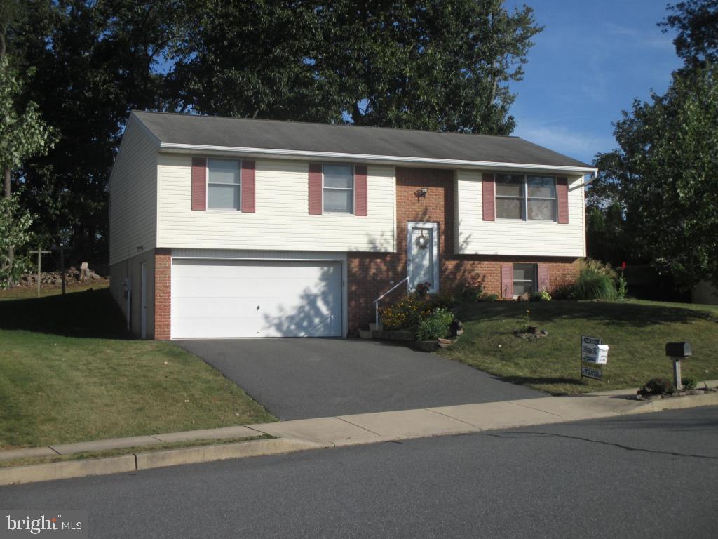 Super Clean Single family home located on outer loop of development with mature trees and private rear yard finished basement.