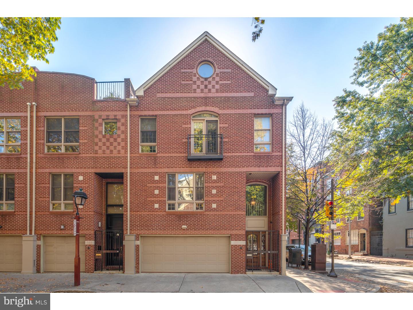 This Society Hill masterpiece features a 2-car garage and an impressive 27 foot, extra wide floor plan. One of the widest homes in Center City, this CORNER home features 3 bedrooms worthy of being master suites as well as a 4th bedroom/den and an office. The spacious living room boasts crown molding, a beautiful fireplace, and fantastic ceiling height. The adjoining music room provides access to the huge 2nd floor deck while the formal dining area and wide open kitchen overlook the majestic floorplan. The kitchen is drenched in natural sunlight provided by a triple wide window and is accented with granite countertops and island, stainless steel GE Monogram appliances and wine cooler, and an abundance of carefully crafted cabinetry and tile. This home is truly one of a kind and offers every imaginable amenity at a prime location in the highly desirable Society Hill. Three outdoor spaces include: a brand new 17'x14' roof deck with gas, water, and electric, a large deck extending from the 2nd floor living room, and a first floor patio. Combine all of this with hardwood floors, dual zone HVAC system, 3 fireplaces, built-in speakers throughout, security cameras, and incredible architectural details to create one of the most stunning homes in Society Hill.