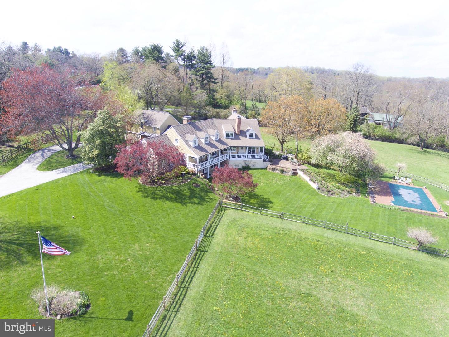Enter down a long tree lined drive to this magnificent 4.8 /- acre Radnor Hunt property. Consisting of; house, barn, pastures, pool, 2 car attached garage plus one detached, and separate guest / in-law suite, make this a rare, complete Willistown farmette. On highly desirable Hillview Road, enjoy the tranquility of the open lot and surrounding similar properties. 4 bedroom, 4 full and 2 half baths which has been added onto over time, to include a large kitchen with exposed beams and soapstone counters opening up into a large great room with two fireplaces and tall ceilings. Included in the additions is a large master suite with a fireplace and lots of windows taking advantage of the views. French doors all around provide easy access to patios and porches - great for entertaining. Fabulous pool with brick surround set in an idyllic location overlooking the beautiful grounds. 3 stall barn, tack room and fenced pastures with easy access to trails and a short hack to Radnor Hunt. First time this special property has been available in 25 years. This Willistown farmette is a fantastic opportunity for both the equestrian as well as the non equestrian looking for a country lifestyle within close proximity to Philadelphia, the R5 and Amtrak, Phl airport, and all the Main Line and Radnor Hunt has to offer.