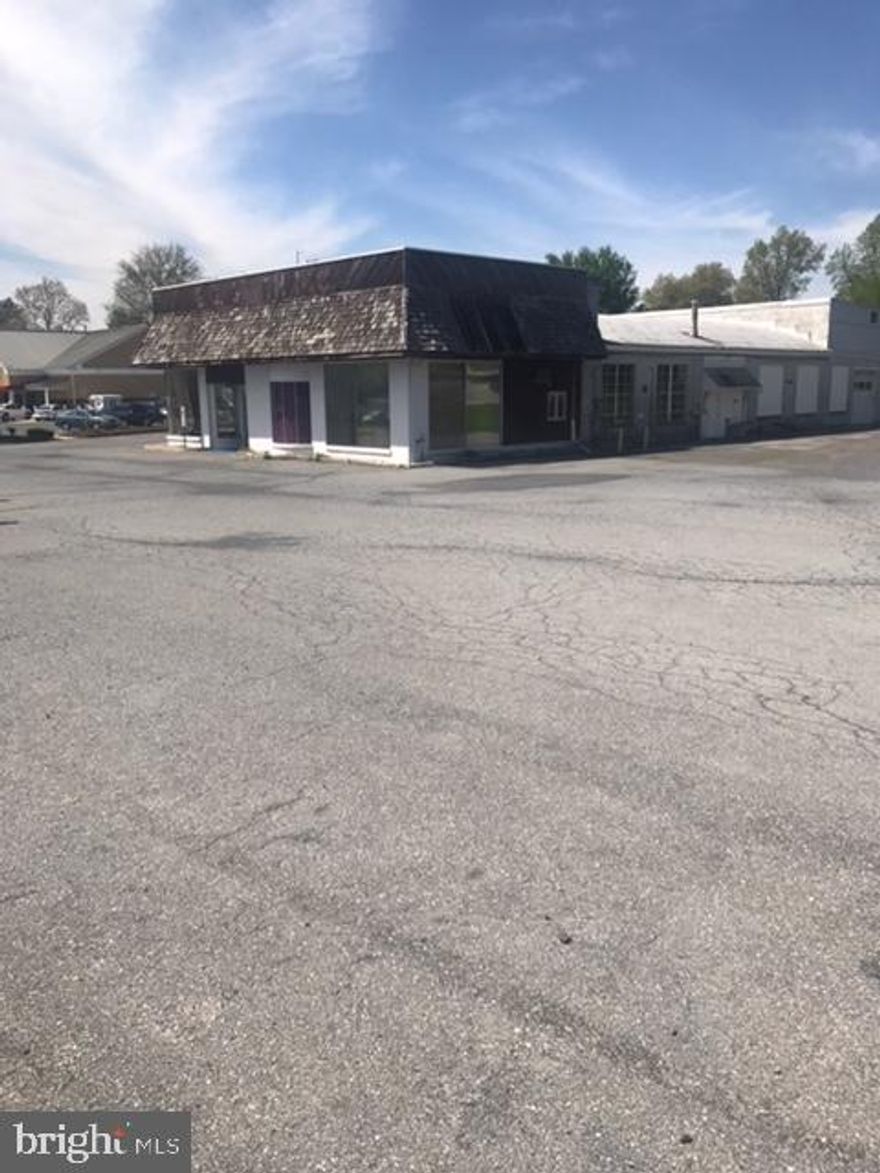 2 buildings total 9,800 S. F.  Main building is 7,800 S.F.  Rear building is 2,000 S.F.  Corner lot on Penn Ave.  High traffic count.  Adjacent to WAWA.