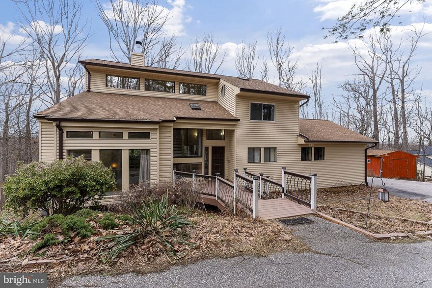 This stunning 4-bedroom, 3.5-bathroom home is located in the sought-after Worthington Hillside II subdivision in Reisterstown. Step inside to a bright entryway with vaulted ceilings, stained glass windows, and gleaming hardwood floors throughout. The spacious living room features a double-sided fireplace shared with the family room. The open kitchen boasts stainless steel appliances, upgraded countertops, a breakfast area, and access to a large backyard deck. The main level also includes a half bath, laundry room, and garage access. Upstairs, you'll find three bedrooms, a full bath, and a spacious primary suite with a walk-in closet and private bath. The lower level offers a fourth bedroom, a spa-like full bath, a luxurious sauna, and an entertainment room with a theater.  Major updates include a new main water line (2015), a 50-year roof (2020), and a Lennox HVAC system (2019) with a 16-year warranty. The backyard is perfect for entertaining, featuring a huge deck, a screened-in porch, and a shed.  Conveniently located near I-795 with easy access to major highways and shopping. Don’t miss out on this incredible home!