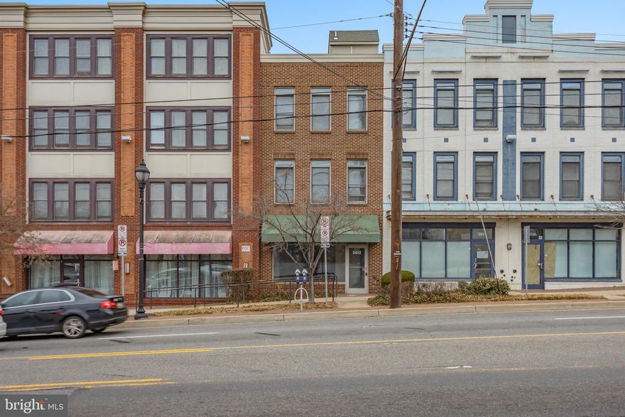 Welcome to 5612 Baltimore Ave, a unique mixed-use property located in the vibrant Hyattsville Arts District—an exceptional live-work opportunity. This three-story building features a commercial space on the ground floor and a two-level residential unit above, offering 2 bedrooms, 2.5 baths, and a roof deck. The residence is freshly painted, boasts new appliances and beautiful hardwood floors, and comes with 2 assigned parking spaces.

Enjoy the convenience of walking to local shopping, restaurants, and other community amenities, or take a stroll through the charming Hyattsville Historic District. With separate entrances for commercial and residential tenants, this property offers flexibility and distinctive character. Don't miss this rare opportunity!
*To help visualize this home’s floorplan and to highlight its potential, virtual furnishings may have been added to photos found in this listing. *