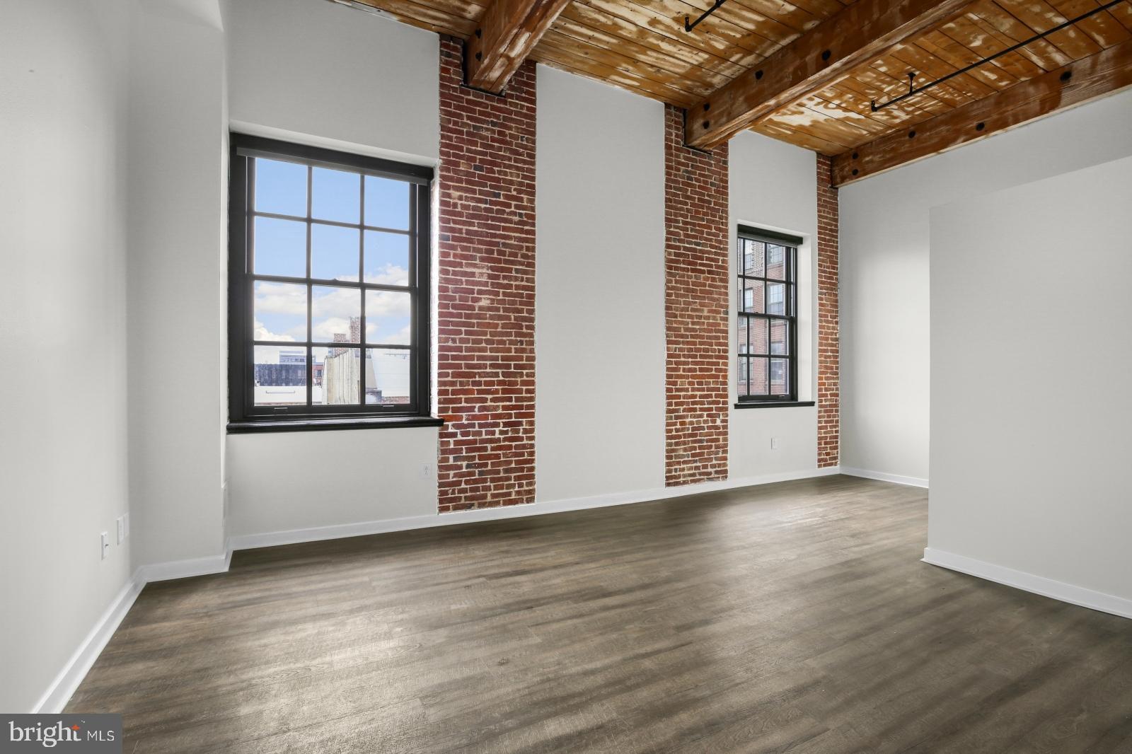 Available NOW | Leasing Special: 1.5 months FREE on a 16-month lease! Gross rent is $1,825/month, net effective rent is $1,653/month.
Welcome to Penn's View, where history meets modern luxury living. Originally constructed in 1901 as a leather tannery, this meticulously restored Georgian Revival-style building is located in the heart of Old City. This gorgeous rental building features an elevator and stylish apartments with distinctive touches such as 16-foot ceilings, exposed brick walls, and wood beams. Unit #403 is a 1 bedroom, 1 bathroom apartment on the fourth floor with a lofted bedroom. Enjoy updated mixed flooring, natural light, and open floor plans for a unique ambiance in each apartment. Indulge in the convenience of central air conditioning and in-unit laundry. Galley kitchens boast ample cabinetry and stainless steel appliances, perfect for culinary enthusiasts. Retreat to full bathrooms adorned with stylish tiling and sleek finishes, offering a serene sanctuary after a long day. Each unit offers its own personality, secure entry and an elevator ensure peace of mind. Experience urban living at its finest at Penns View.
Lease Terms:
Generally, 1st month, 12th month, and 1 month security deposit due at, or prior to, lease signing. Other terms may be required by Landlord. $55 application fee per applicant. Pets are conditional on owner's approval and may require an additional fee, if accepted. (Generally, $500/dog and $250/cat). Tenants responsible for: electricity, cable/internet, and a flat water fee ($35/month for 1BD, $50/month for 2BD). Landlord Requirements: Applicants to make 3x the monthly rent in verifiable net income, credit history to be considered (i.e. no active collections), no evictions within the past 4 years, and must have a verifiable rental history with on-time rental payments. Exceptions to this criteria may exist under the law and will be considered.