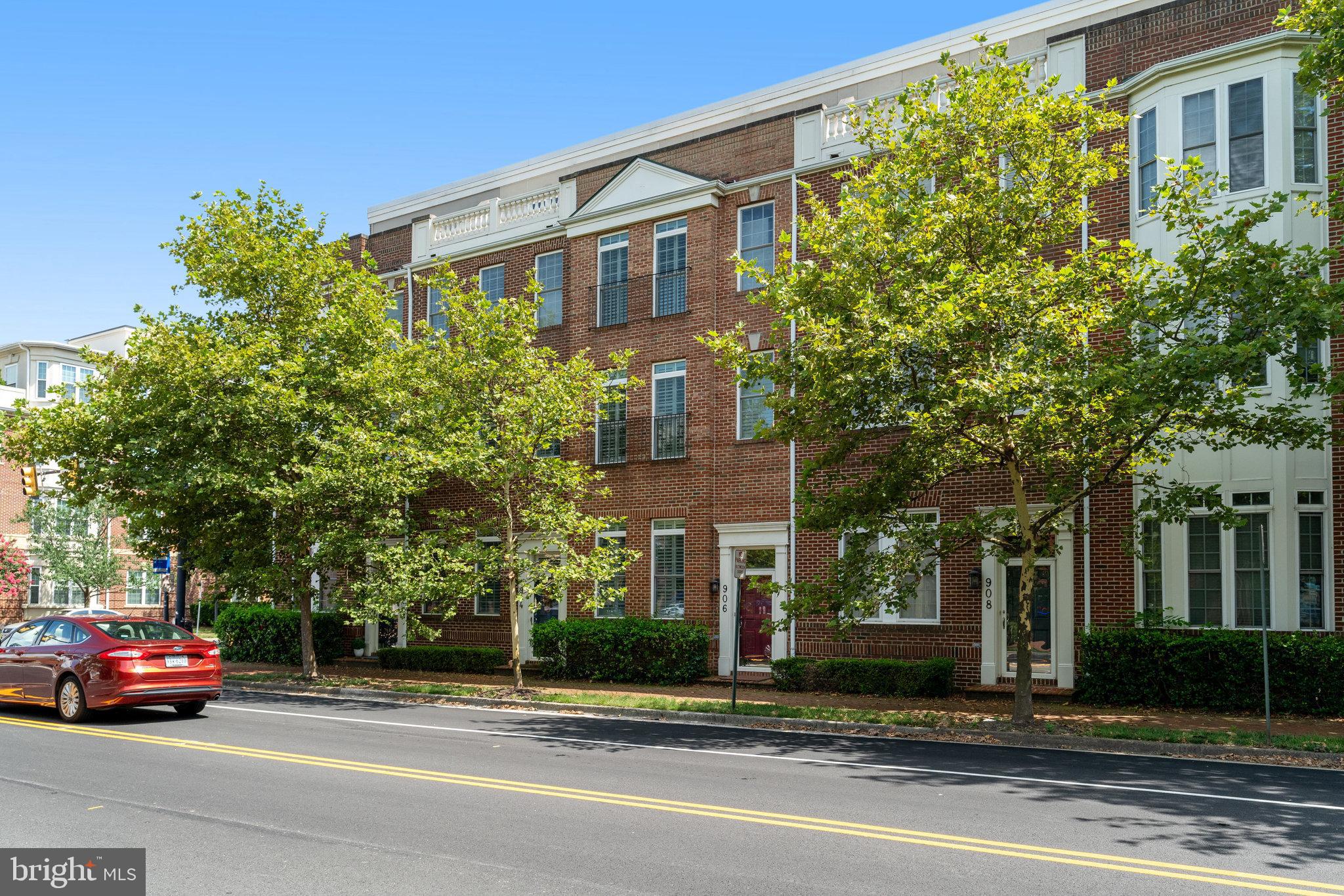 Step into a spacious, modern townhouse boasting over 3,000 square feet of beautifully updated living space, complete with 3 bedrooms, 4.5 bathrooms, a study/office, 2 private outdoor areas, and 2 underground garage spaces just outside lower-level entry. Ideally situated, this home is bathed in natural light thanks to its large windows and the open living and dining area flows into a generous eat-in kitchen with a breakfast nook. The kitchen is decked out with stainless steel appliances, granite countertops, a gas cooktop, with a large private, newly fenced patio ideal for outdoor dining. The expansive primary bedroom, features hardwood floors, serves as a personal sanctuary with a sitting area, walk-in closet, and a luxurious en suite bathroom with a Jacuzzi tub, separate shower, and dual vanities. This level also includes a laundry room with a full-sized washer and dryer, plus storage. Upstairs, you’ll find 2 additional bedrooms, 2 full bathrooms, and a study/office with French doors. The incredible top floor is perfect for entertaining, with a large private rooftop deck and stunning, unobstructed views of DC monuments, you have the unique and special bonus of viewing spectacular July 4th fireworks without the DC crowds! The adjacent family room, including full bathroom, also has the potential to be used as a 4th bedroom. Located just minutes from National Airport, National Landing, Metro, the Pentagon, and Washington, DC, this home is steps from the GW trail and across from popular dining and shopping spots like Buzz Bakery, Rustico, and Slaters Market. It’s also a short walk to the bus stop and the new Potomac Yard Metro station.