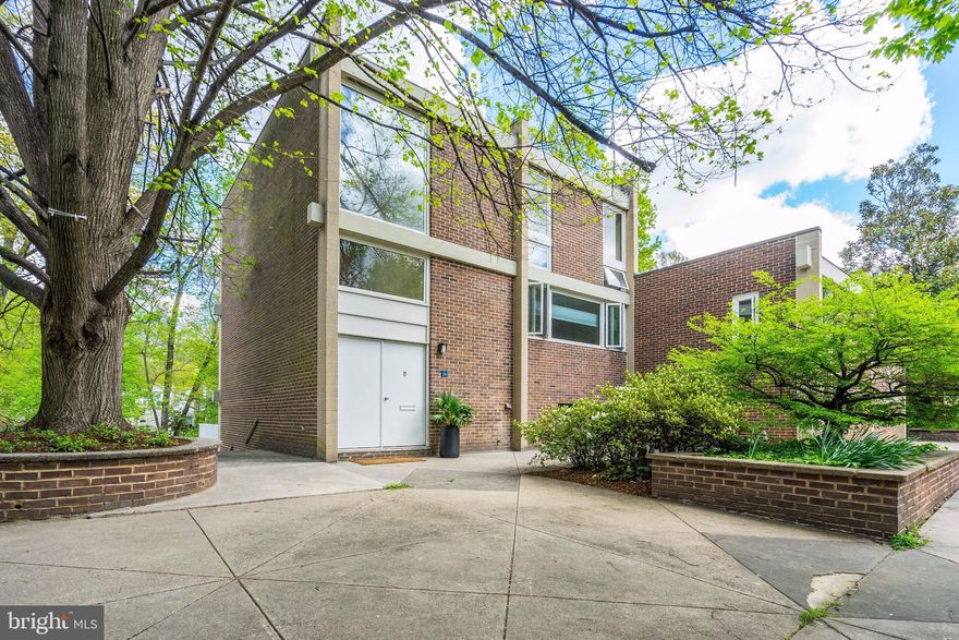 Charles M. Goodman Mid Century Designed Home in Reston's Hickory Cluster. One of the largest 3bedroom 2.5 bath End Unit with one of the best views of the walking trail and creek with beautiful trees abound. There's also a rooftop terrace! Updated Anderson windows and sliding doors throughout. Walking distance to Lake Anne and the famous Reston Farmers Market! These don't go on the market often and the last few have all sold before hitting MLS.