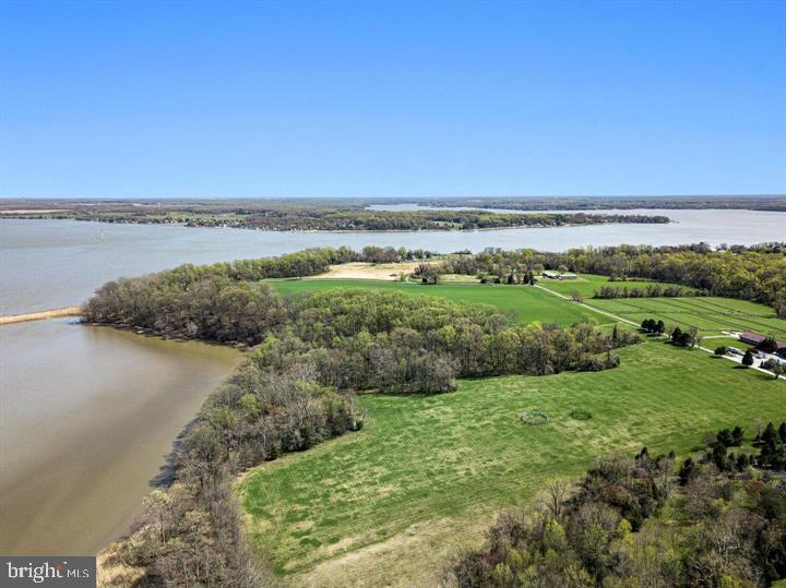 An oasis unto itself, this 39+ acre park-like waterfront setting with approximately 1,000 ft shoreline is an unbelievable find. Woods, open fields, water views are the highlights of this incredible parcel.
Absolutely Under NO CIRCUMSTANCES Shall Buyer Or Their Agents Enter Upon This PRIVATE PROPERTY Without A Representative Of The Listing Brokerage.