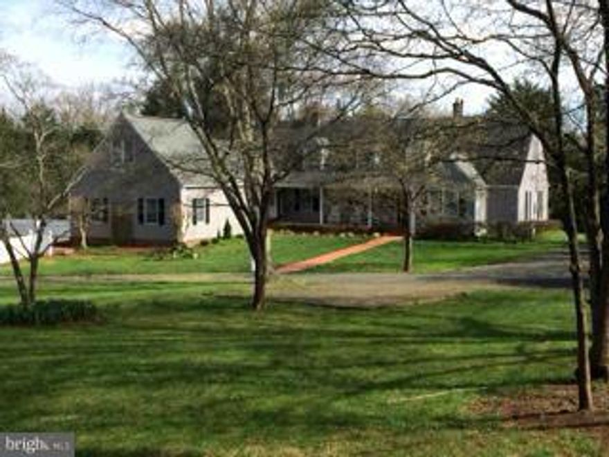 Horse lovers! 6 bdrm Cape Cod in peaceful park-like setting -10+ acres, main level MBR/sitting room/new bathrm, oak flooring main level, brand new granite kitchen, fish pond, gunite pool, outbuildings, two 2 car garages, 6 bedrooms 4 full and 2 half baths, decks, covered porches & fencing, 3 zoned HVAC, 2X6 construction, 35 yr roof, finished lower level in-law suite. Well built builder's home.