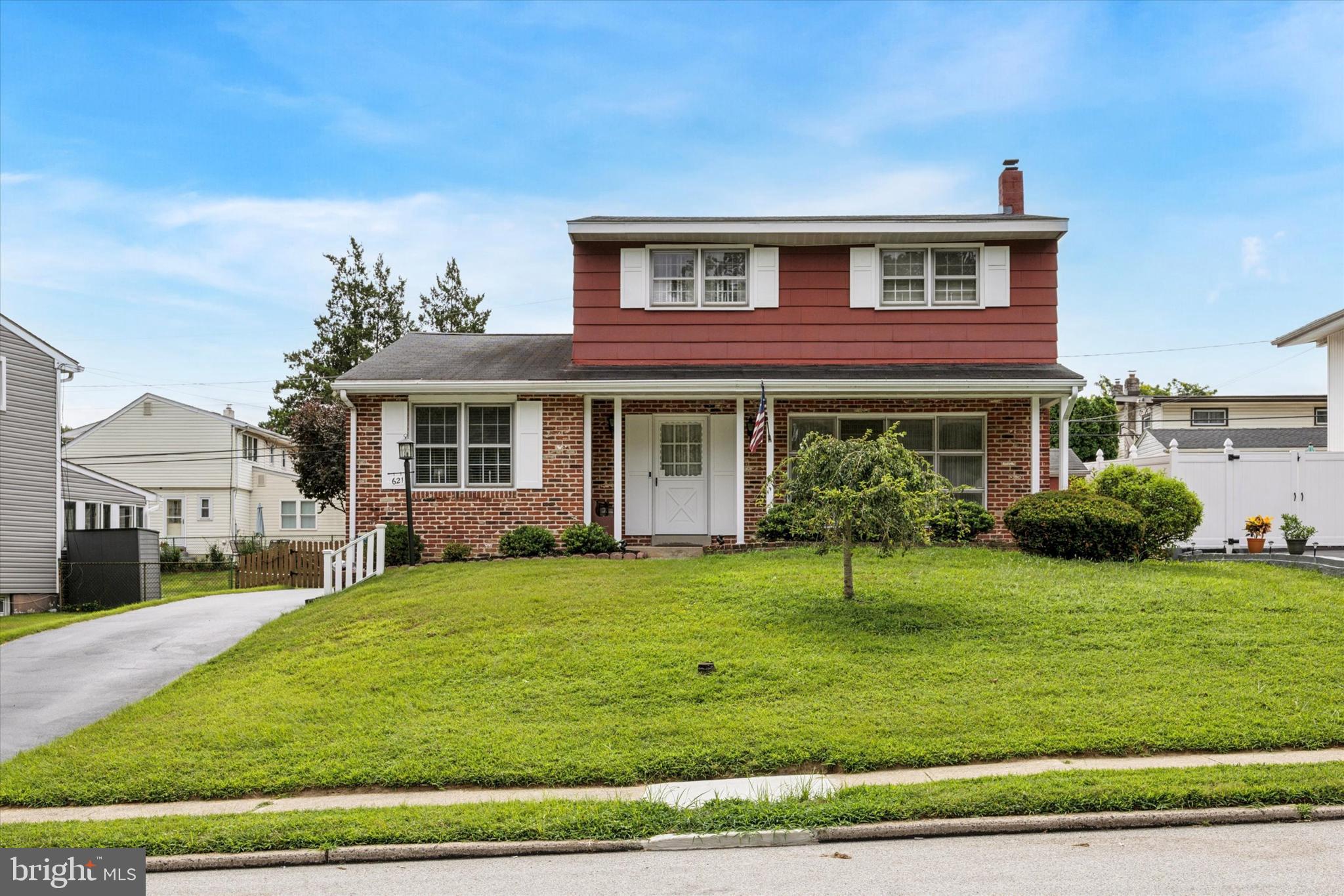 For the first time in 52 years, this rare Lawrence Park Colonial is now available for a new owner to make it their own. Wonderfully maintained by its longtime owner, the good bones of this home is ready for someone to dress it up again for the future! Before you consider the actual property, consider what the location offers; easy access to major highways, the airport, public transportation, shopping, restaurants, public parks and the low taxes often associated with Marple township. In addition, the Marple-Newtown school district has been a destination school for many Delaware county families for decades, with the Loomis elementary school within walking distance.
The home itself offers 3 large bedrooms, a primary bathroom, Hall bath and two powder rooms. One on the main level and one in the finished basement. Entry is from a covered front porch into a center hall. To the left is a Family room with built in shelving and window seat. The main level powder room is located here along with direct access to the kitchen. To the right off of the foyer is the formal living room with a large picture window with a custom sliding window treatment, truly unique. Moving forward is the formal dining room with a convenient pass thru access into the kitchen to facilitate your dinner parties. The kitchen offers a dishwasher, disposal, gas cooktop and electric double wall oven. The cabinetry is fantastic and beautifully built. There is a separate eating area in the kitchen as well. From there you have access to a large laundry room with some nice shelving and storage that can double as a pantry. From here you can access the rear screened porch with storm windows as well which could easily serve 3 seasons and rear fenced level yard with a storage shed.
The second level offers a primary bedroom with a ceramic tile bath plus two other large bedrooms and hall bath. There is hardwood flooring under all of the carpeted areas on the first and second levels.
The basement is finished and features a large area to entertain, and a built-in wet bar is ready to keep everyone refreshed. A multizone gas hot water heating system will keep you warm during the winter. There is a gas fired back-up generator in case of power outage. And the seller is offering a one-year American Home Shield warranty for the first year.
This is a fantastic opportunity in a sought-after location, come and make this house your home!