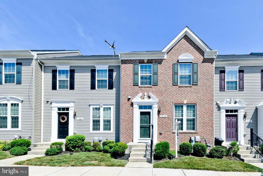 NEW PRICE! BUY OF THE WEEK OR CHECK OUT A SPECIAL PROGRAM TO RENT W/OPTION! Ready to move in 3 bedroom, 2 1/2 bath Brick Front Town Home! Hardwood on entire main level, open floor plan, large kitchen island, granite, gas cooking & heat! Dining area & Family/Sitting Area off Kitchen. Finished lower level has slider to level backyard. 2 assigned parking spots in front & great yard backing to trees.