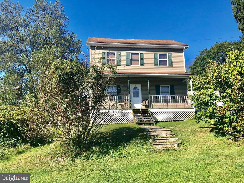 Large furniture, no problem! This home features large open rooms. Living, dining and bedrooms. Eat in kitchen and first floor laundry. Brand new oil boiler. Front and side porches plus balcony leaves plenty of room to relax. Recently updated and ready to go!