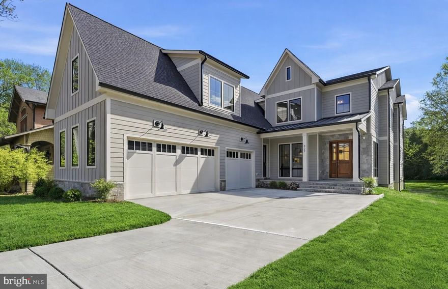 OPEN SUNDAY, APRIL 19, 1:00-3:00. Just Listed from Jefferson Homes.  Exceptional new construction offering over 7,000 square feet of thoughtfully designed living space in the heart of Vienna. This stunning residence showcases clean, modern finishes paired with timeless design, including wide-plank hardwood floors, a chef’s kitchen with oversized center island, quartz countertops, inset cabinetry, and a statement range hood.

The custom floor plan is both functional and elegant, featuring a spacious family room with an Anderson four-panel sliding door that seamlessly opens to a screened-in porch with a stone-front gas fireplace—perfect for indoor-outdoor living. The main level also includes a formal dining room, private study, sun-filled breakfast room, walk-in pantry, guest bedroom with full bath, and a generously sized mudroom with built-ins. A dedicated future elevator shaft, currently finished as walk-in closets, adds flexibility for long-term living.

Upstairs, you’ll find four ensuite bedrooms and a beautifully appointed laundry room. The fully finished lower level is designed for entertaining and everyday enjoyment, complete with a recreation room, game room, full wet bar, fitness room, and an additional bedroom with full bath.

The exterior is equally impressive, blending Hardie-Plank siding and stone with dramatic floor-to-ceiling Anderson 400 Series windows for a sophisticated transitional aesthetic. A three-car garage with electric vehicle charger adds modern convenience.

Ideally located within walking distance to Louise Archer Elementary and Madison High School. Built by Jefferson Homes, a respected Vienna builder with over 20 years of experience, known for exceptional craftsmanship and high-quality materials.

Experience the perfect combination of luxury, functionality, and enduring value in one of Vienna’s most desirable locations.