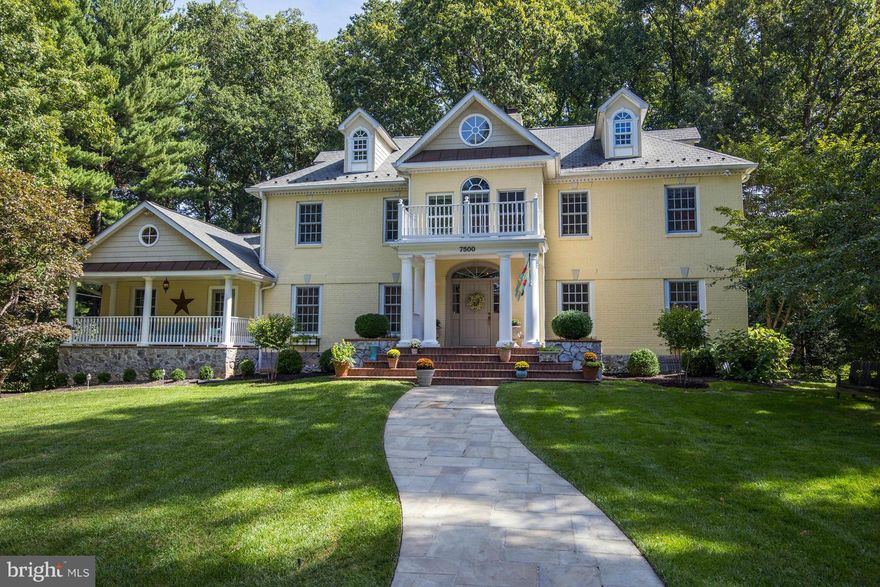 Stunning Georgian colonial on .5-acre lot backing to golf course. Built mostly new in 2002, dazzling home features high ceilings, dramatic curved staircase + back stairs, gorgeous Lois Kennedy kitchen, elegant main level master/guest suite + 2nd MBR up, library, exquisite millwork, 5 FPs, gleaming oak floors, window seats, walk-out LL, 2 charming porches, fabulous rear yard!