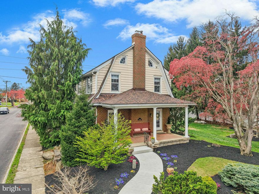 A tree-lined street in a thoroughly charming neighborhood is the setting for this inviting home in the deep west end of Allentown. Built in 1927, the residence has wonderful curb appeal with a colorful array of plantings framing the classic Dutch colonial brick exterior. 
     Gleaming wood floors accent over 1,600 square feet of well-kept living space. Rooms that are bright and spacious on the main level include an office/sunroom, living room with wood-burning fireplace, formal dining room, and well-appointed eat-in kitchen exuding charm with archways and original vintage farmhouse sink. The upper floor offers a primary bedroom, two additional hall bedrooms, and a full bath with desirable vintage detail. The bluestone patio is a lovely spot to star gaze on a summer evening.  A detached two car garage, off-street parking pad and oversized beautifully landscaped yard are notable amenities. 
     The location is a prime one with several Allentown parks within walking distance as well as Lehigh Valley Hospital, Muhlenberg College and a thriving city center minutes away. Commuter routes I-78, Route 22, and the Pennsylvania Turnpike are easily accessed.
