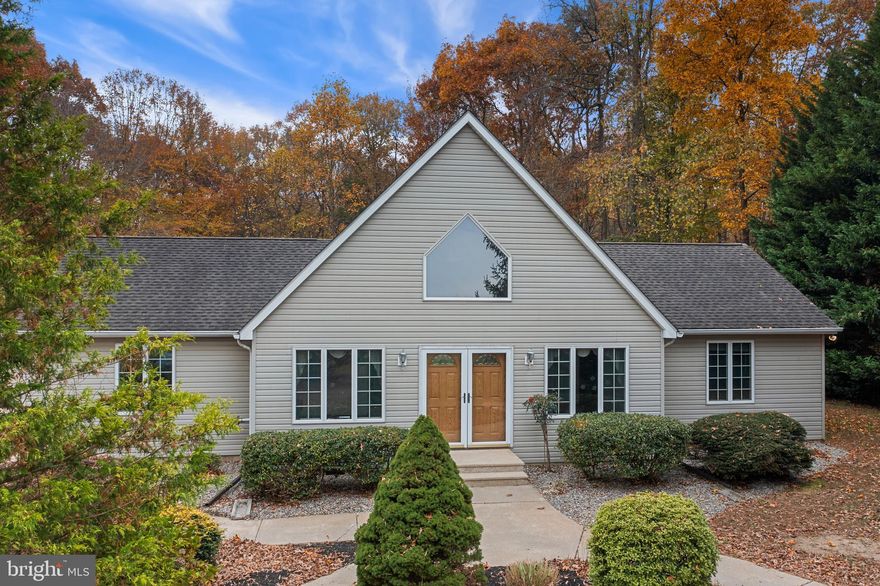 Nestled on 8.94 +/-  serene acres, this welcoming contemporary home provides a perfect blend of comfort and tranquility. Tucked away at the conclusion of a peaceful farm lane, the home offers the feel of a secluded retreat, yet is located just minutes from Centreville. As you enter through the front door, you are greeted by a warm and inviting living room adorned with vaulted ceilings. The first floor features three well-sized bedrooms, a kitchen boasting ample dining space, and a delightful sunroom bathed in natural light. The second floor offers a primary bedroom with oversized closets, and a full bathroom. Outside, you will find an in-ground pool, two sheds, and a large pole barn/detached garage for ample storage.