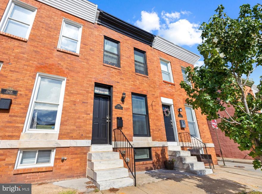 4 BEDS, 3 BATHS, PARKING, ROOFTOP DECK, CHAP, BRAND NEW ROOF! Located in the heart of Canton just one block from Patterson Park and steps from great restaurants, this 4-bedroom, 3-bath home blends modern updates with classic Baltimore charm, such as exposed brick walls, stained glass transom, original hardwood floors, and curved archways. Freshly painted inside and out, it features brand-new carpet, a refinished rooftop deck, and a brand new roof —ensuring peace of mind and move-in readiness  (all work done in 2025). Enjoy outdoor living on the spacious rooftop with skyline views, plus the convenience of a private parking pad. With 2 years of CHAP tax savings remaining, this rare gem offers unbeatable value. Don’t miss the open house this Friday from 5:30-7:30!