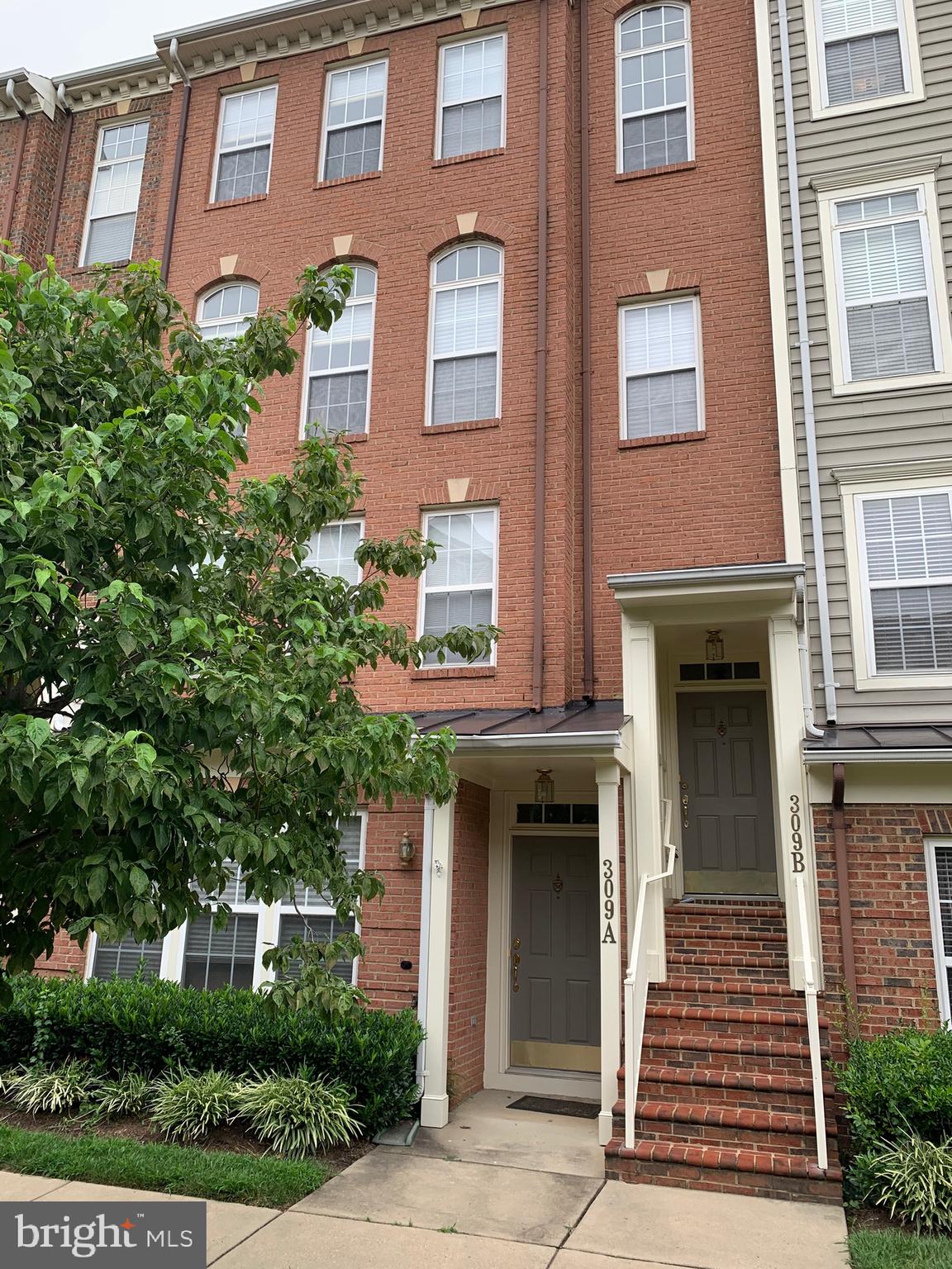 Popular upper level townhome-style condo B unit with a contemporary open floor plan and attached garage in the best courtyard location in the highly sought-after Lakelands community. Updated 3BR 2.5BA home boasts large arched windows, an enormous living and dining room combination with double-sided gas fireplace, and a spacious kitchen with newer stainless steel appliances, beautiful corian counter tops. A large deck off of the multi-functional family room. Newer Beautiful Hardwood flooring throughout the main level. The upper level features three bedrooms including the master bedroom suite with a vaulted ceiling, walk-in closet and huge bathroom with double sinks, a soaking tub, and all-glass stall shower. Hallway bathroom with a tub/shower combination and a conveniently located laundry closet with a side-by-side washer and dryer. Located within walking distance to the neighborhood pool and clubhouse as well as the shops and restaurants in the downtown Kentlands!Terrific community lifestyle! Quiet courtyard setting!