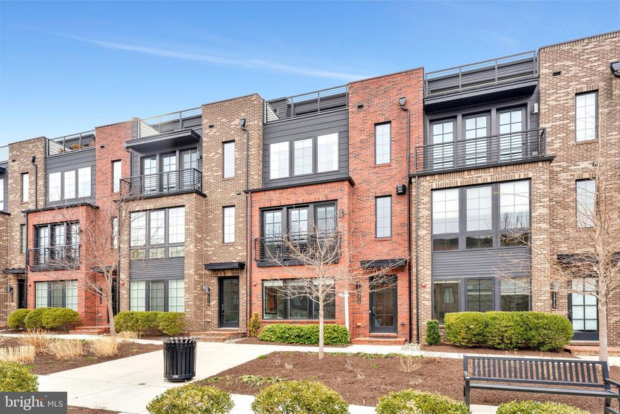 Welcome to 11716 Paysons Way, a stunning contemporary townhouse in the heart of Reston, VA. This elegant residence boasts 2,834 square feet of sophisticated living space, featuring four generously sized bedrooms and four and a half luxurious bathrooms.

Step inside to discover a bright and inviting atmosphere, accentuated by oversized windows that flood the home with natural light. The spacious living area is enhanced by a cozy gas fireplace, perfect for relaxing evenings. The well-appointed kitchen showcases modern finishes, stainless steel appliances and a large island with ample space for culinary endeavors.

The primary suite is a true retreat, offering 2 walk-in closets and an ensuite bathroom with a separate shower and a soaking tub, ideal for unwinding after a long day. Additional bedrooms provide plenty of space for guests or a home office.

Outdoor enthusiasts will appreciate 2 outdoor spaces. A beautiful expansive roof deck with custom Trex decking, perfect for entertaining or enjoying serene views. A deck off the kitchen is a place to enjoy morning coffee or a glass of wine before dinner. This home offers the convenience of an attached 2 car garage. Set in a prime location this townhome offers easy access to trails, golf course,  Reston Town Center, restaurants, shopping and 2 Metro stations.

This townhouse is a rare find, offering a blend of contemporary style and practical living. Don't miss the opportunity to make 11716 Paysons Way your new home. Schedule a private showing today and experience the charm and elegance this exceptional property has to offer.