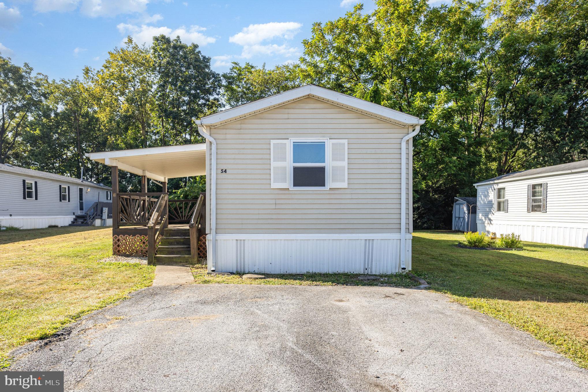 **Charming Fully Renovated 2-Bed, 1-Bath Single Wide Mobile Home**
Welcome to your move-in-ready dream home! This stunning 2-bedroom, 1-bathroom single wide mobile home has been completely transformed with modern upgrades and stylish finishes throughout. Perfect for cozy living or a low-maintenance retreat, this home offers comfort, convenience, and charm.
**Key Features:**
- **Gourmet Kitchen:** Fully remodeled with new soft-close cabinets, sleek butcher block countertops, an oversized stainless steel under-mount sink, and brand-new stainless steel appliances. A chef’s delight!
- **Bright & Modern Interior:** New energy-efficient windows flood the home with natural light, complemented by new luxury vinyl plank flooring and updated lighting/electrical throughout.
- **Remodeled Bathroom:** Fully renovated with a contemporary new vanity, modern toilet, and fresh fixtures for a luxurious feel.
- **Outdoor Oasis:** Relax on the spacious covered deck, perfect for entertaining or unwinding. The large lot backs up to serene woods, offering privacy and a peaceful natural backdrop.
- **Bonus Storage:** Brand-new insulated shed provides ample space for tools, hobbies, or extra storage.
This meticulously updated home combines modern convenience with a tranquil setting. Don’t miss your chance to own this gem—schedule a showing today!