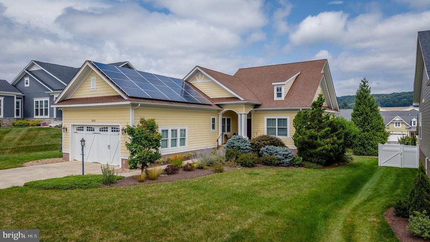 Soak up the natural light in this Preston Lake home, built with energy efficiency and quality at its core. The thoughtful floor plan makes one-level living easy, with spacious common areas and bedrooms that flow seamlessly together. At the heart of the home, the oversized great room and kitchen create the perfect space for gatherings. Just beyond, you’ll find a bright sunroom and a flexible office or den—ideal for hobbies, work, or extra guest space. The primary suite is tucked away at the back for privacy, separate from the guest bedroom and full bath up front. Downstairs offers an additional bedroom, full bath, light-filled living area, and nearly 1,500 square feet of unfinished storage. The main level is ADA-compliant, and this EarthCraft home with solar panels keeps monthly electric bills impressively low. Quality details abound: crown molding, box ceilings, solid wood doors, tankless hot water, air purifier, water softener, and security system. Outside, enjoy a rear deck with Massanutten Peak views and beautifully maintained landscaping.