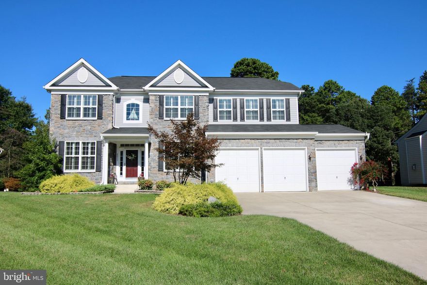 OPEN HOUSE, Saturday, February 29 from 11 to 1 AND Sunday, March 1 from 1 to 3. Experience the openness of this Delaware model by KHovnanian Homes. Main level features wide-open floor plan. Upscale gourmet kitchen with granite counters, 7' center island, GE Profile appliances, and plenty of 42" cabinet space! Beautiful hardwood flooring throughout most of the main level. The Family Room has a soaring two-story ceiling with a stone gas fireplace. Breakfast Room off Kitchen with plenty of morning sunlight. First floor also has a half bath, home office, Dining Room and Living Room. Paver patio off the back with private yard backing to trees. Luxury owner's suite with upgraded spacious Bathroom and large walk-in closet. 2nd floor laundry for your added convenience. Cat walk overlooks the large 2 story family room below. Lower level has large rec room featuring wet bar, gaming area, full bath and large storage room. Plenty of parking with 3 car garage, driveway, and on-street parking. Additional features include an irrigation system. Great location with easy access to NSA, Ft. Meade, BWI Airport, Marc Train, Baltimore, Annapolis and DC. Area improvements include a new Old Mill High School and improvement to Randazzo Park. Come to see all this home has to offer!