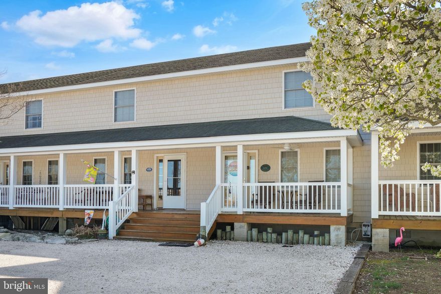 Discover your dream home in this beautifully maintained 1-bedroom+ BONUS ROOM, 2 1/2-bathroom townhouse nestled on picturesque Chincoteague Island. The charming covered front porch welcomes you into a modern tile foyer, leading to a spacious and open living area filled with natural light. The airy living room invites comfort and style, perfect for both relaxation and entertaining. The large eat-in kitchen, featuring washed oak cabinetry, offers ample space for culinary adventures. A convenient 1/2 bathroom and a laundry area enhance the main floor's practicality. Upstairs, the primary suite provides a serene retreat with its private bathroom, while  a bonus room and full bathroom cater to family or guests. From the kitchen, sliders lead to a private rear deck, ideal for outdoor gatherings and unwinding in tranquil surroundings. A shed offers extra storage space. Experience island living at its finest in this delightful townhouse, where every detail is designed for comfort and sophistication.