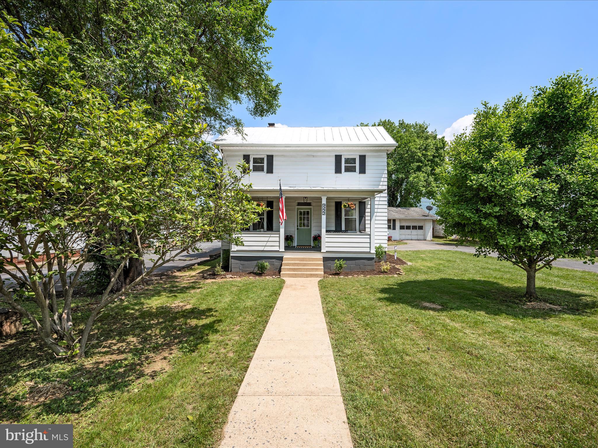 *Back on the market, due to note fault of the seller. Welcome to this fully updated 4-bedroom, 2-bathroom home in the heart of New Market - offering the perfect blend of character, comfort, and convenience.
Inside, you’ll find 9-foot ceilings on the main level, all-new flooring, and bright, freshly painted rooms. The gorgeous kitchen features quartz countertops, stainless steel appliances, and brand-new cabinetry, ideal for both everyday living and entertaining. A laundry/mud room with exterior access adds practicality to the well-designed floor plan. This floor plan also includes one bedroom and one full bath on the main level, making single-level living an easy option. While upstairs, you’ll find three additional spacious bedrooms and a second full bath, giving everyone their own space.
Both bathrooms have been tastefully renovated, and over the years, the electrical and plumbing systems have been updated for peace of mind. The home is also equipped with dual-zone heat pumps for efficient year-round comfort.
Outside, the metal roof has been freshly painted, and the front porch has been recently updated with Trex decking, offering the perfect place to relax and take in the neighborhood. The partially fenced backyard with privacy fencing, detached garage, and private driveway round out the outdoor amenities.
Located just minutes from shops, dining, and major routes (Route 11, Route 211, and I-81) this home is ideal for commuting while still enjoying the charm of small-town living.
Don’t miss your chance to own this beautifully updated home!
