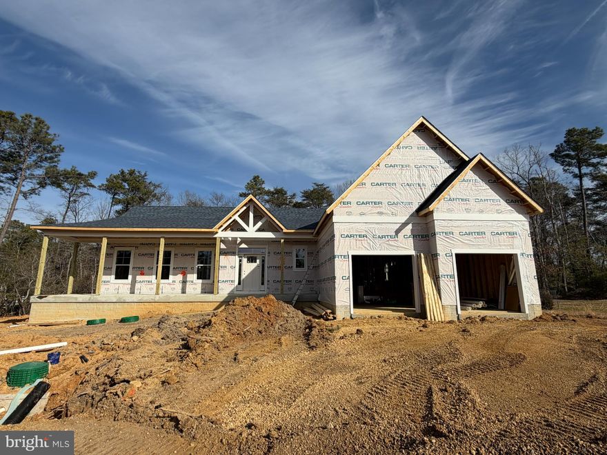 The PARKER Model, Elevation One **  Please excuse our mess while construction is underway ** Wonderful Front Porch ** One Acre Plus WOODED Level Lot **FABULOUS KITCHEN w/Super Island & Granite Counters *** Huge PANTRY *** Upgraded STAINLESS Appliances *** First Floor Primary Bedroom complete with Custom Box Ceiling *** Master Bath with CUSTOM Walk in SHOWER w/Custom Seat ** Two Additional Main Floor Bedrooms with private Bath *** OPEN Floor Plan ***Full BASEMENT w/ FINISHED REC ROOM, DEN with closet & Full BATH with TUB *** Two Car Garage ** LUXURY VINLY FLOORING throughout Main Level ** Internet Available *** Street Lights ** Builders Warranty *** One of St. Mary’s county’s best locations. The community is over 300 acres. Porto Bello offers a rare opportunity to live in a quiet oasis of 1+ plus acre wooded lots. Just minutes away from Rt. 2/4 located just south of Leonardtown, Maryland. Drayden, Maryland is a beautiful town that is bordered by water and close to the PAX base, shopping and entertainment.