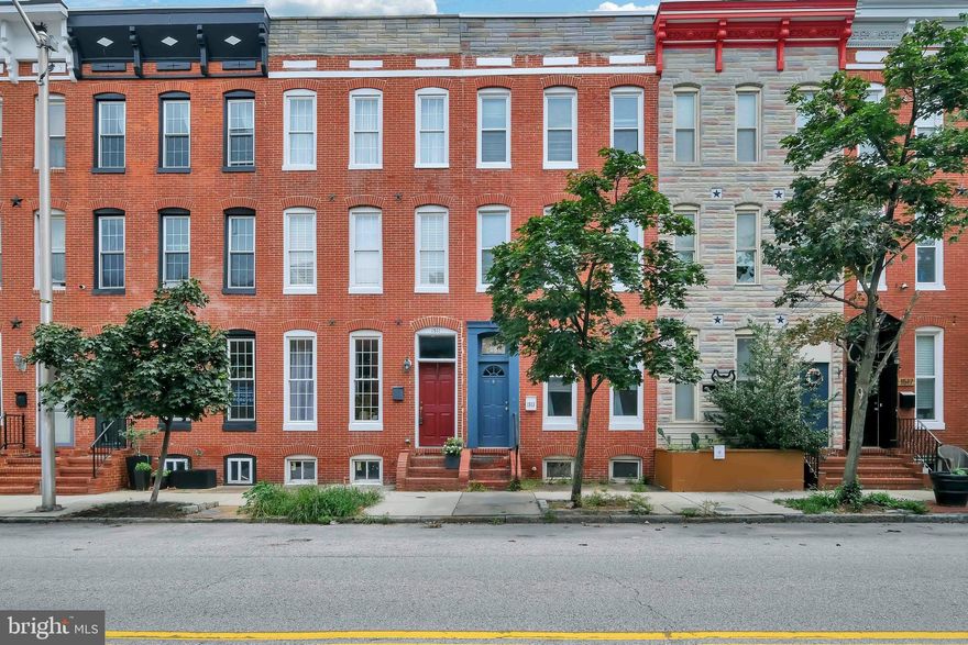 Price Reduced for quick SALE.  This home is larger than most with 4 levels and private parking. Welcome to 1513 S. Charles Street, where historic charm meets modern convenience in the heart of Federal Hill! This stunning townhome invites you in with hardwood floors and expansive 14'9" lot, offering a spacious and inviting living area. Imagine entertaining friends on your private roof deck with breathtaking views, or enjoying the luxury of private parking in this highly sought-after neighborhood. The partially finished basement provides endless possibilities for storage or recreation. Just steps away from the vibrant Cross Street Market, trendy bars, and top-notch restaurants, as well as the Orioles and Ravens stadiums, this location is unbeatable. Plus, with quick access to I-95 and 295, your commute to Washington DC is a breeze. Don't miss your chance to own a piece of Baltimore's charm—schedule your tour today and experience the allure of 1513 S. Charles Street for yourself!