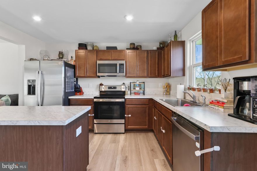 Skip the wait and step into this newly built (2023) single-family home offering modern comfort, efficiency, and low-maintenance living. Featuring 3 bedrooms and 2.5 bathrooms, this home is thoughtfully designed with a functional two-story layout and bright, open living spaces. The main level flows seamlessly, perfect for everyday living and entertaining, while efficient systems and central air provide year-round comfort. Upstairs, you'll find well-sized bedrooms including a comfortable primary suite, along with flexible space for guests, a home office, or more. Step outside to a spacious backyard where you can enjoy beautiful views of the river—a rare and peaceful setting that adds to the home's appeal. Set on a generous lot, this property offers space to relax, entertain, or customize to your needs. Modern construction, scenic views, and move-in-ready convenience—this one stands out. Ask how to receive lender credit towards closing costs or lowering your interest rate!