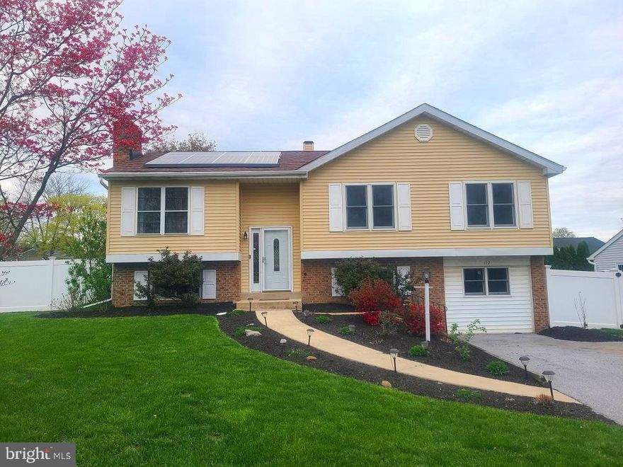 Welcome to 112 Cathy Ann Drive in the Farming Ridge Development.  Exeter Schools. Great location in the development sitting on a spacious fenced in corner lot. This 4 bedroom, 2 full bath home offers a nice open floor plan with a large Living Room/Dining Room combination. Kitchen includes plenty of counter top & cabinet space. Kitchen has counter seating area with barstools. Down the hall you will find 3 nice sized bedrooms with great closet space.  Freshly painted Full bath has an entry to master bedroom. Lower level spacious Family Room with a brick wood burning fireplace. 4th bedroom in the lower level could be used for office or craft room... possibilities are endless. You will find another Full Bath on the lower level along with the Laundry room and Bonus Room. French doors off the Kitchen/Dining Room leads you to a beautiful 2 tier deck & pool overlooking the large back fenced in yard.  Just in time for your summer days and nights. 23 panel Solar panel system (installed 2023) is owned by the homeowner and provides great energy efficiency . Nice size private back yard with newer 6 foot vinyl fence(2023) with 50 year limited warranty, nice landscaping, gardens, fire pit area, included playset and a shed for extra storage. Move in just in time for your summer enjoyment, entertaining by the pool or by the firepit in the evenings.  Enjoy a nice walk to the nearby Farming Ridge Park.