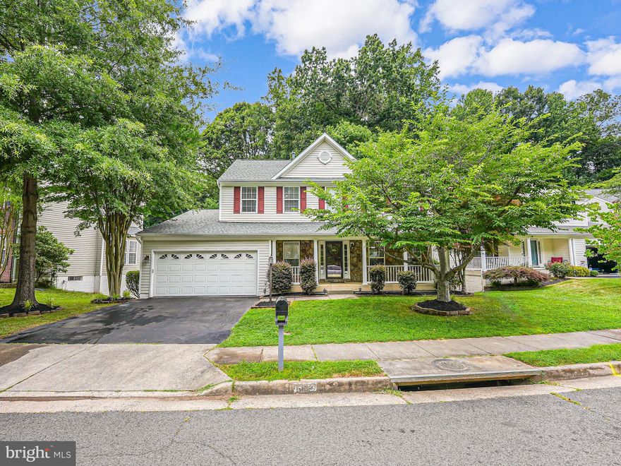 Welcome to 5612 Eppes Island Place! This rarely available Dakota Washington Model in the sought-after Ashland Community is move-in ready and has so much to offer. With 5 bedrooms and 3.5 bathrooms, this home features a fully finished basement and is located on a cul-de-sac backing to a serene wooded area.

As you enter the spacious foyer, you're greeted by hardwood floors that flow through the formal living room, dining room, and upgraded kitchen. The eat-in kitchen boasts stainless steel appliances, granite countertops, an island, a double sink, plenty of cabinet storage, and access to the deck.

The window-lined family room is spacious, providing ample space for relaxation and entertainment. Upstairs, the peaceful primary suite features vaulted ceilings, a private ensuite bathroom with double sinks, a luxury glass-doored shower, and a walk-in closet. The upper-level guest bath also has double sinks, providing convenience and space for all.

The full basement is wired for sound and includes a utility room, multiple storage rooms, the 5th bedroom, and an additional full bathroom with a walk-in shower. Outside, you can entertain on the covered lower-level stamped concrete patio or the upper-level deck that spans the entire back of the home.

There are so many reasons to love this home. Come see it for yourself!