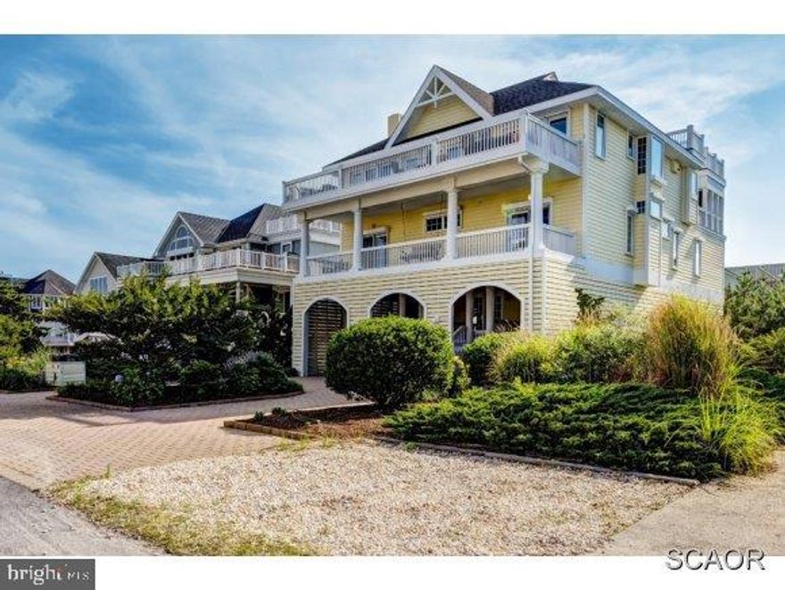 Extraordinary home one off ocean w/unobstructed ocean views. Gated comm. w/pvt. beach access. Gourmet kit., alarm, elevator, FP, MB suite w/scrnd. porch. Lush landscaping, fence, outdr. shower, hurr. shutters, parking for 6-8 cars, pavers, decking. Tallest home in comm. w/stunning views.