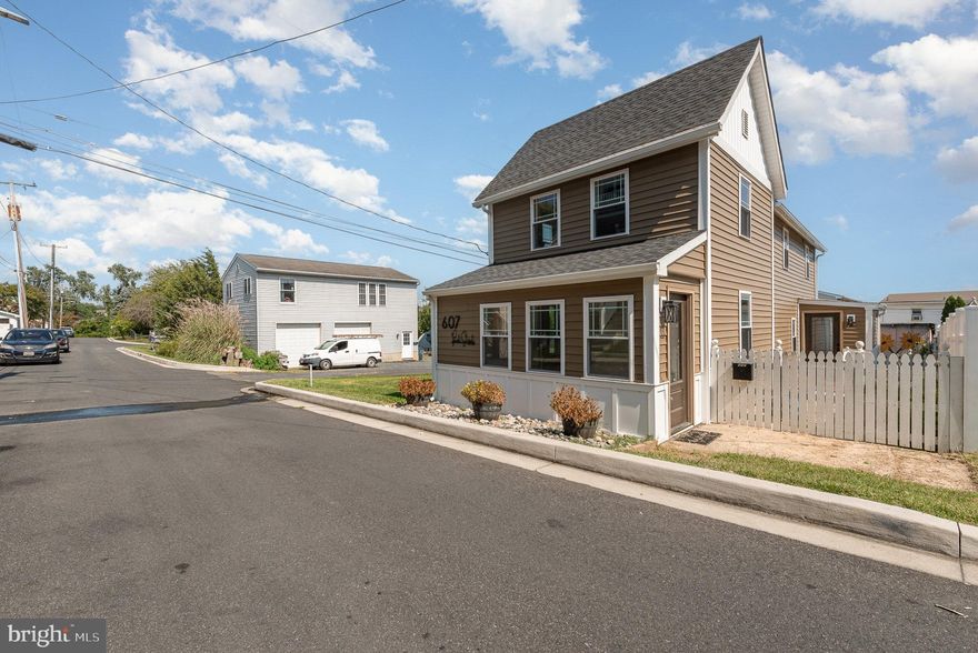 Welcome to this fully renovated and modernized 2 bedroom, 2.5 bath colonial home  just blocks away from the water and downtown Havre De Grace.  This home has been tastefully redone in a modern way while still retaining some of its old country/waterfront charm.  Things such as exposed beams, custom tile work, water views, fully fenced side courtyard and rear yard with large storage shed and gorgeous landscaping make this home the idyllic retreat to live in or possibly even make the perfect Airbnb.  The main level has a sunroom foyer which enters into the large living area, this follows into the formal dining area, powder room and laundry room which then leads into a custom high quality kitchen. The kitchen has granite countertops on one side and butcher block on the other, custom cabinetry, backsplash and stainless appliances.  A door off of the kitchen leads to a tiled mudroom with exits into the side courtyard and rear yard.  Taking the stairs to the second floor leads you to a carpeted floor with two large bedrooms each with their own full modern bathroom.  The finishes and tilework in these bathrooms is remarkable.  Enjoy water views of the Susquehanna from the rear bedroom window.
Heading down into the unfinished crawlspace area gives you plenty of room for access to the mechanical components of the house.  This home has been tastefully done with no detail spared from the trim work throughout to the exterior.  Come see it today and see why you should call it home!
