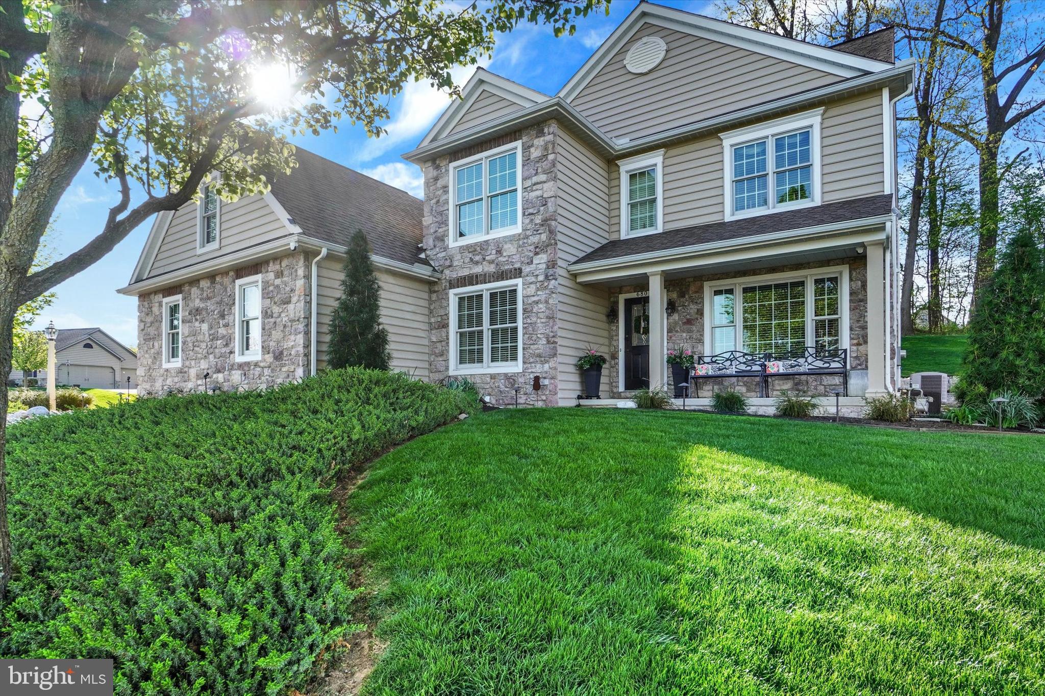 LOOKING TO RELOCATE FROM MD, DE OR NJ??? HERE IS A GREAT LOCATION!!!! Welcome to this Contemporary, two-story residence, a true embodiment of modern living, situated on a 0.55 acre lot in the highly desirable neighborhood of Orchard Hills. Built in 2006 by EG Stoltzfus, and significantly renovated in 2017, this property showcases a harmonious blend of architectural and contemporary design, making it an ideal choice for discerning buyers. The meticulously landscaped exterior is complimented by an 800 square foot patio and 10x12 foot metal pergola, providing a refined outdoor aesthetic. The property boasts a spacious driveway leading to a large three-car garage, ensuring ample parking for residence and guests alike. Step inside to discover a thoughtfully designed interior that spans more than 3,400 square feet. The main level features porcelain tile and solid, hand hewn hardwood flooring, complimented by an abundance of natural light, creating a warm and welcoming atmosphere. The formal dining and living room are conveniently located off the kitchen, while the family room boasts an impressive stone fireplace creating a cozy space for relaxation. The gourmet kitchen is a culinary enthusiasts dream, equipped with black stainless appliances, granite countertops, dual oven, an island for additional prep space and seating, as well as a charming eat-in area. This home includes five generously sized bedrooms and four full bathrooms along with a half bath. The primary bedroom has a vaulted ceiling while the bathroom has been fully renovated to include an enlarged, jetted shower and a dual sink granite countertop completing a spa-like oasis. The upper-level laundry enhances functionality, while the fully finished basement could be used as an in-law suite or entertainment room, possibiliities are endless. It is complete with built-ins, a full bathroom and large storage room with shelving . The outdoor living spaces are equally impressive, featuring a front porch that invites you to enjoy a stunning, panoramic view and a large back patio designed to enjoy the surrounding trees and woods. In summary, this exceptional property offers a perfect blend of luxury, functionality and style. With its prime location, extensive amenities and thoughtful design, it presents an unparalleled opportunity for those seeking a distinguished residence. Experience the best of modern living in this remarkable home, where every detail has been meticulously crafted to provide an extraordinary lifestyle.