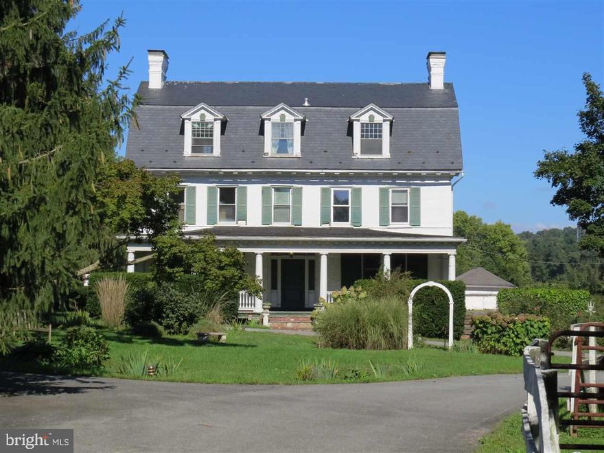 Ever wanted a Farmette or a Piece of History with a majestic home? Here you go   9 acres zoned Agricultural allows many varied uses. Lots of awesome outbuildings. Main home and a carriage house for additional options too. Be sure to ask for the Associate Documents for further uses, insight and info. This is a one of a kind place where your imagination can run wild. Put it on your list to see now!
